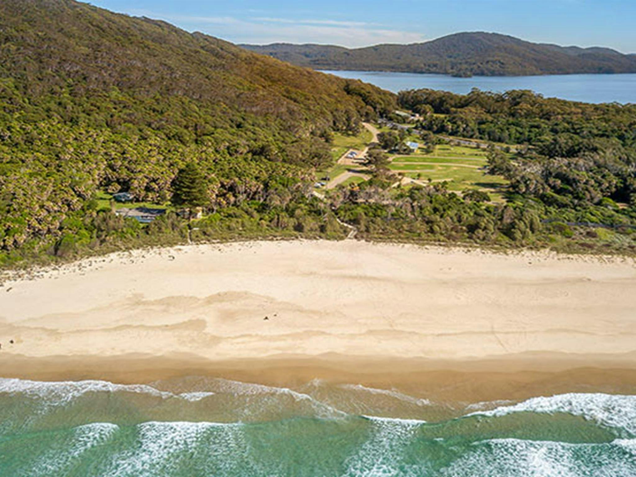 Arial shot of The Ruins campground in Booti Booti National Park, between Wallis Lake and Seven Mile