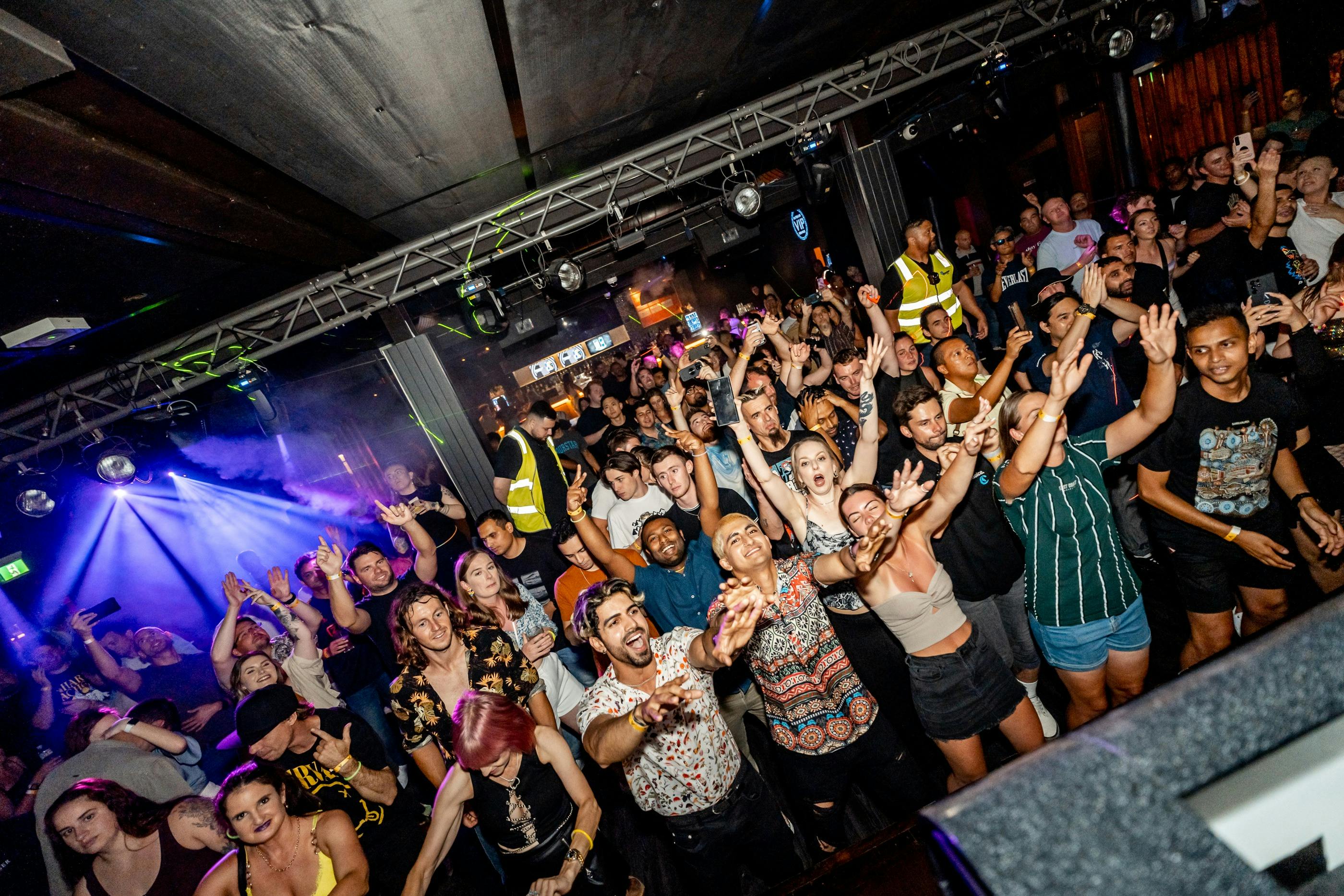 Full dance floor of people