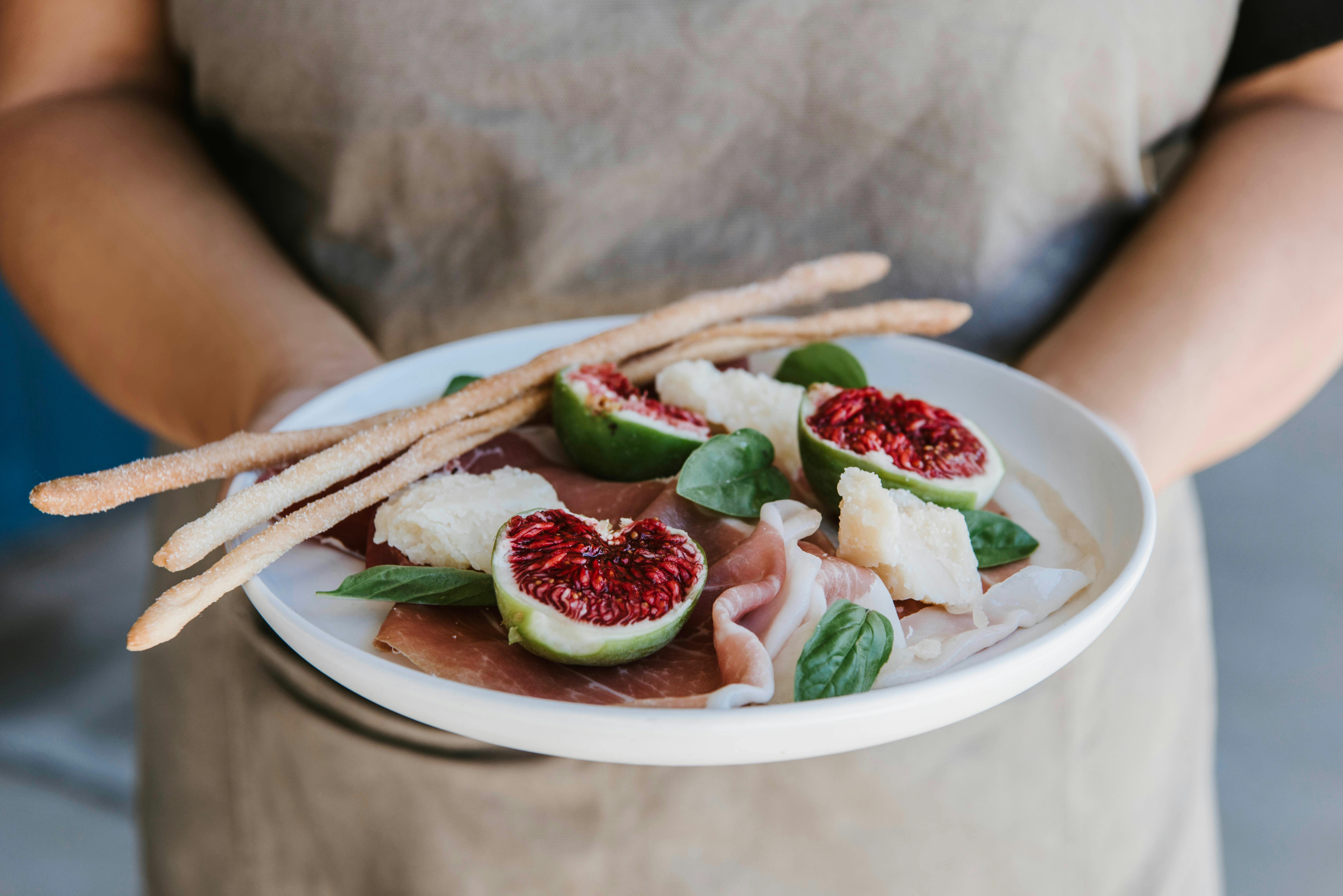 Prosciutto, fresh local figs and semolina grissini