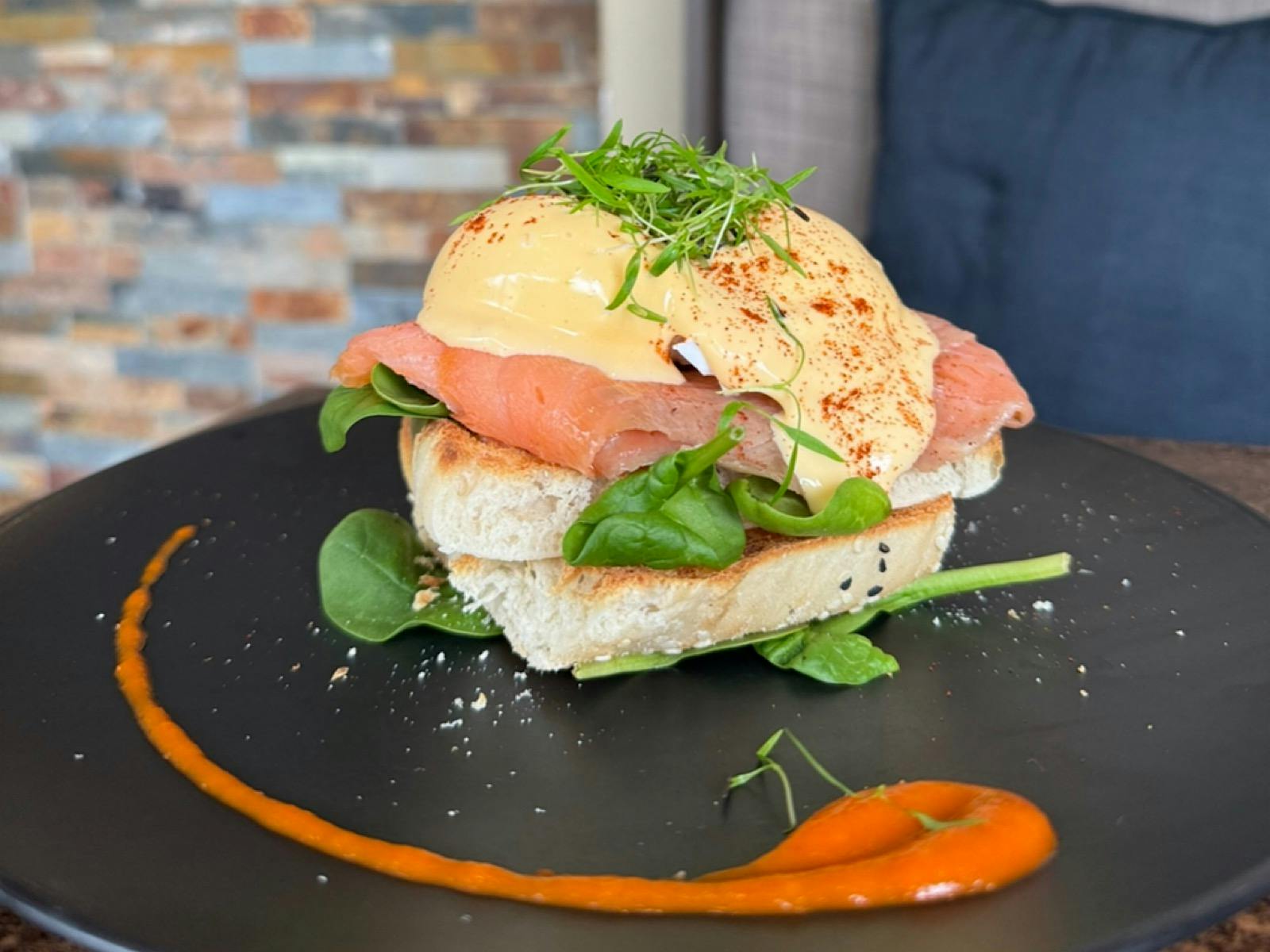Breakfast item: eggs Benedict with an add of salmon