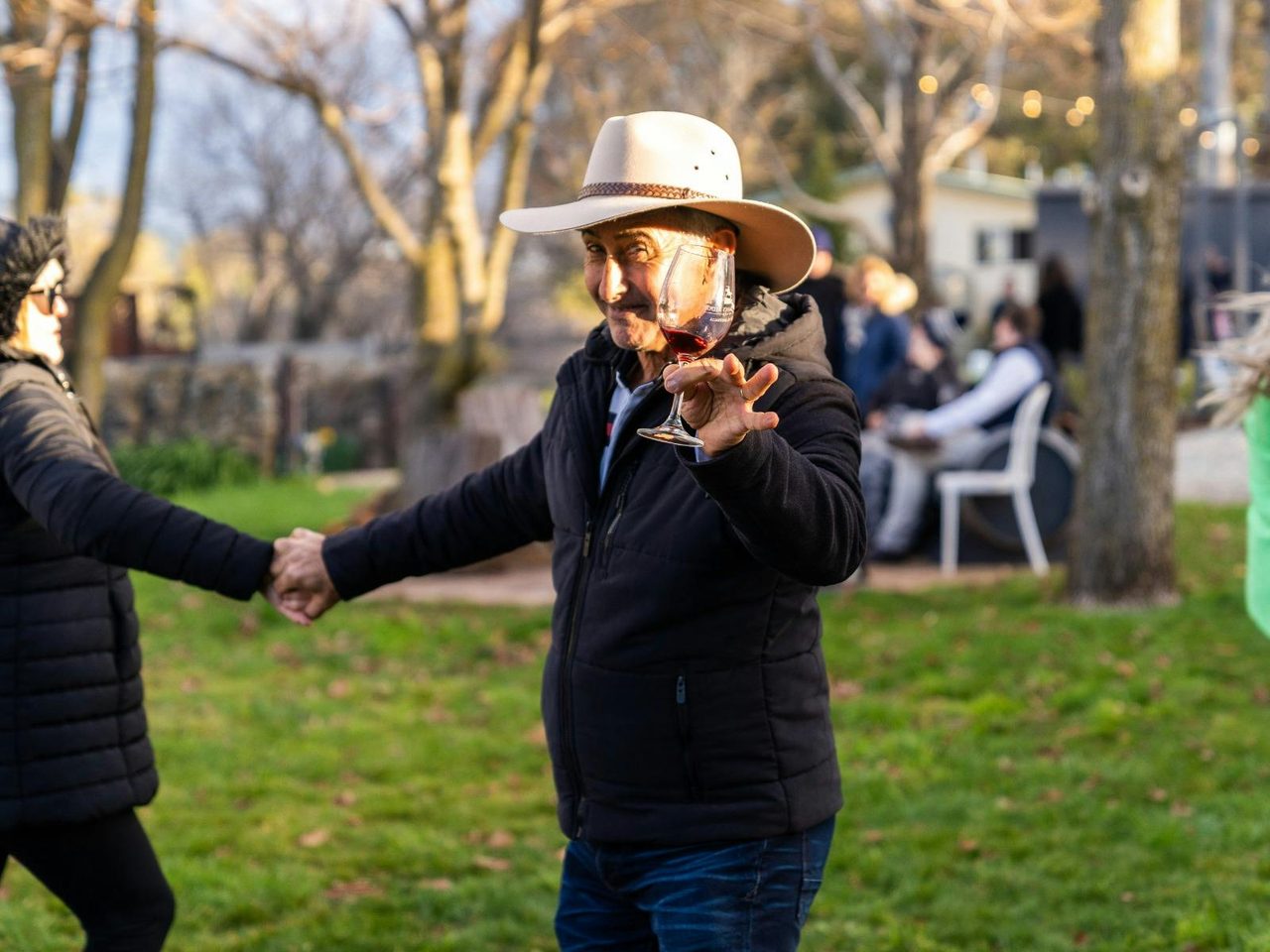 Man dancing with wine