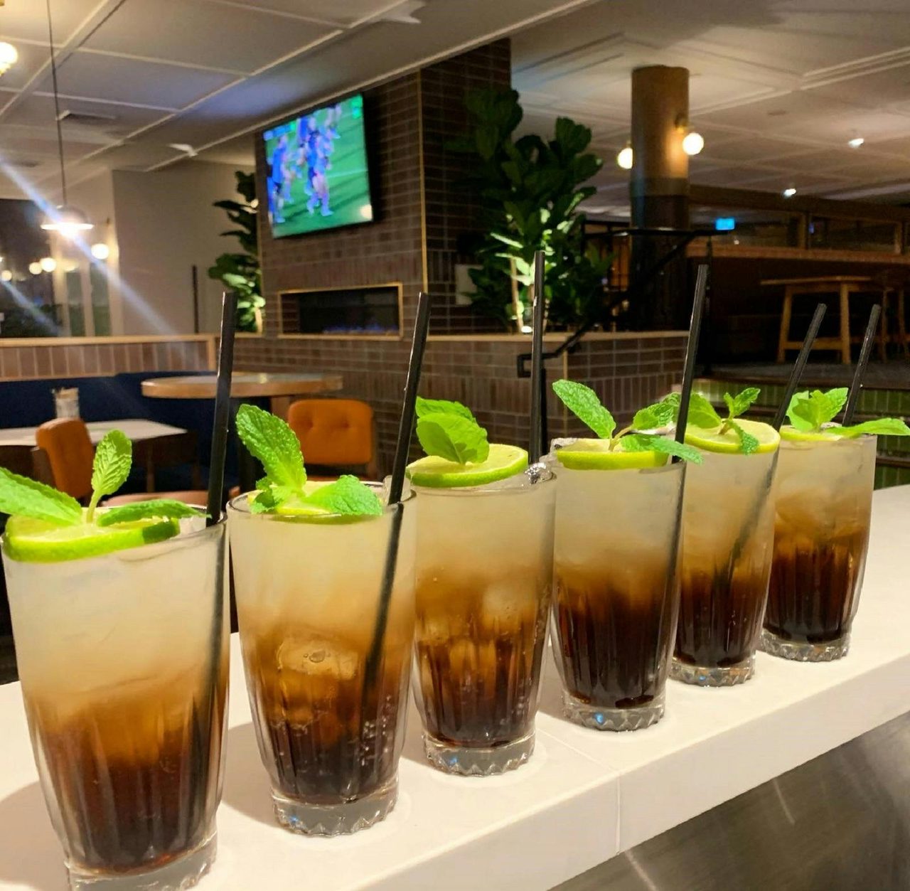 Cocktails lined up at the bar at The Campbell