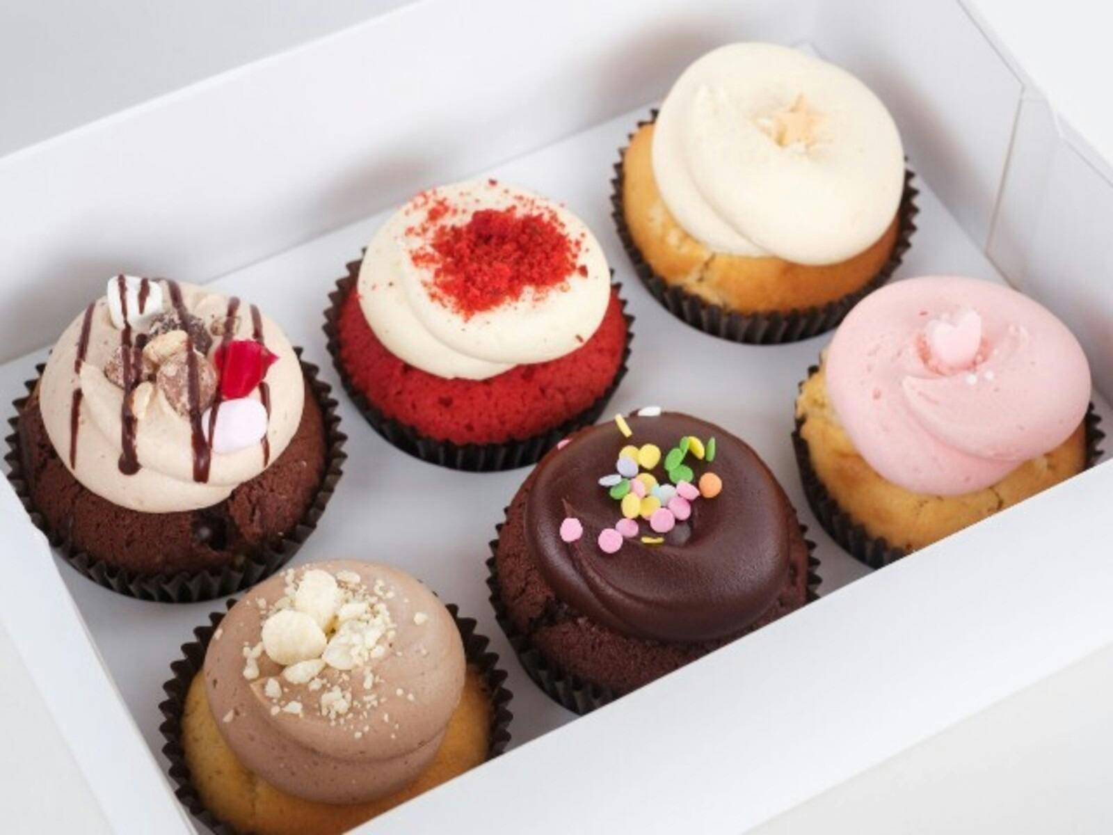 Six various designed cupcakes