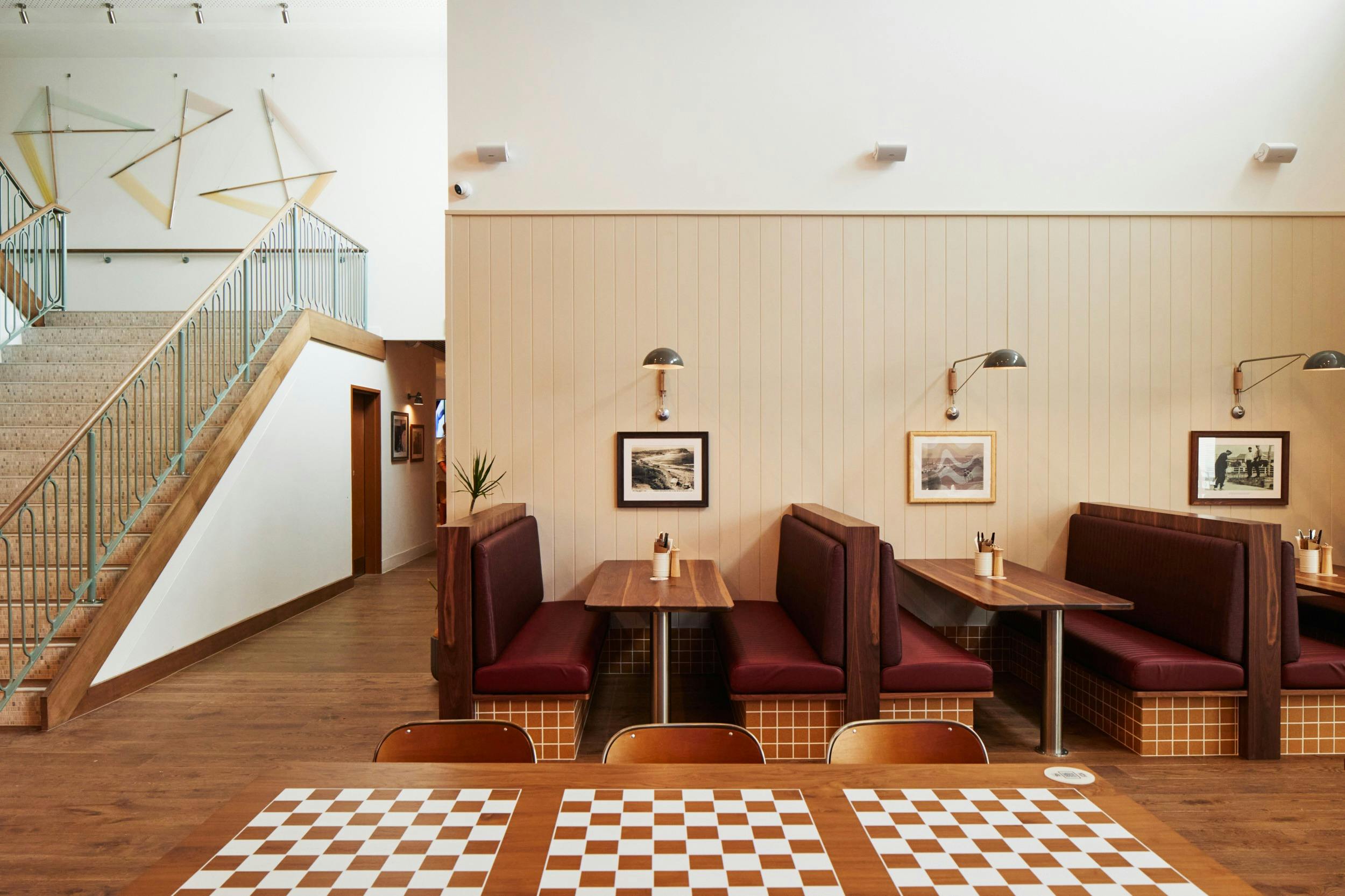 Eating areas and booths for families at The Beach Hotel
