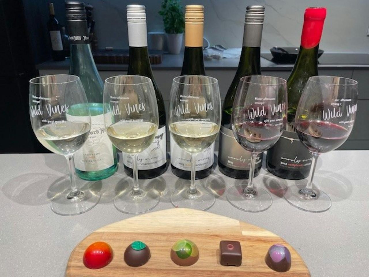 Beautiful platter of artisan chocolates paired with hand crafted Unruly Wines