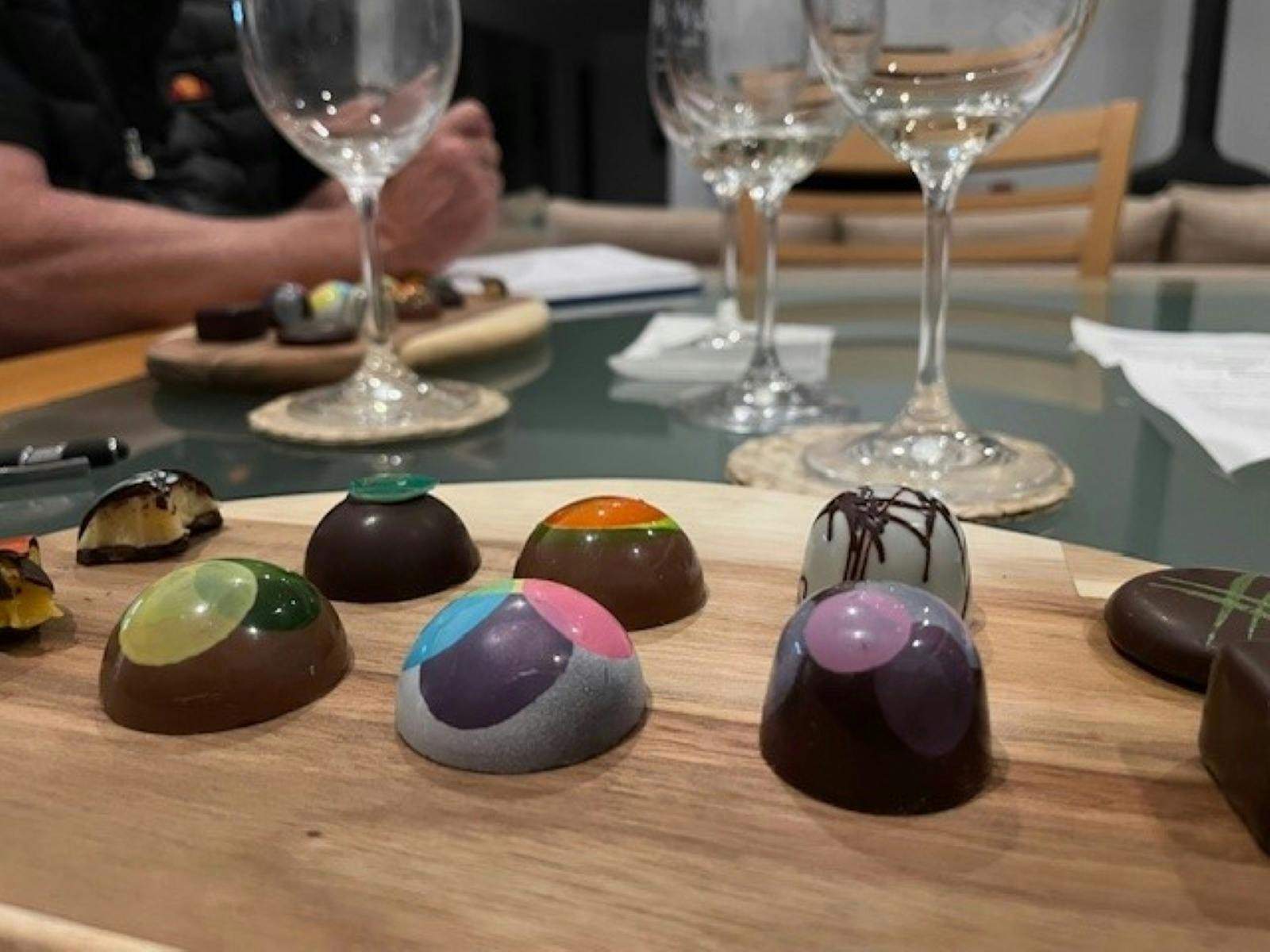 Beautiful platter of artisan chocolates paired with hand crafted Unruly Wines