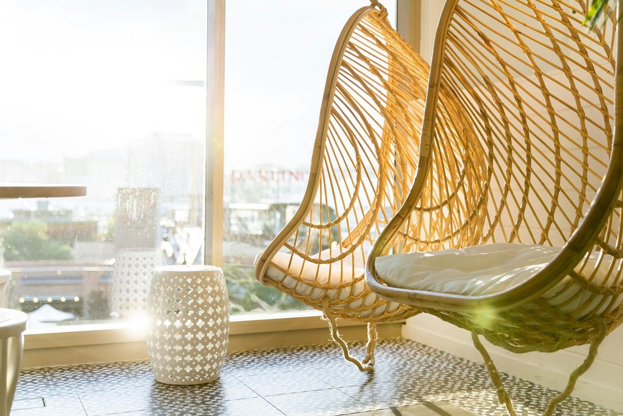 The Rooftop Sydney - Hanging chairs with Darling Harbour views