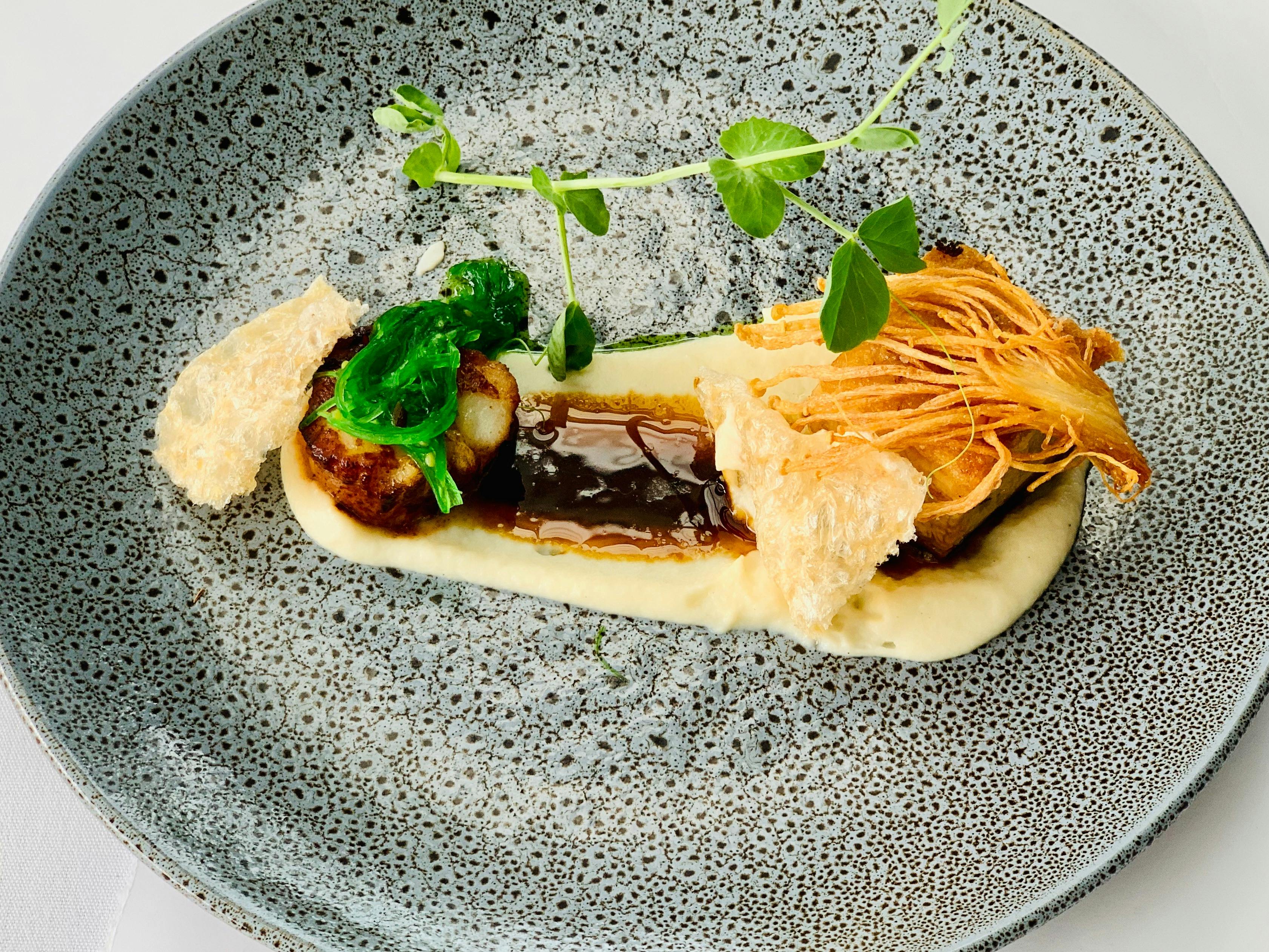 Twice Cooked Pork Belly and Pan Seared Scallop cauliflower purée, chicharron, enoki mushroom