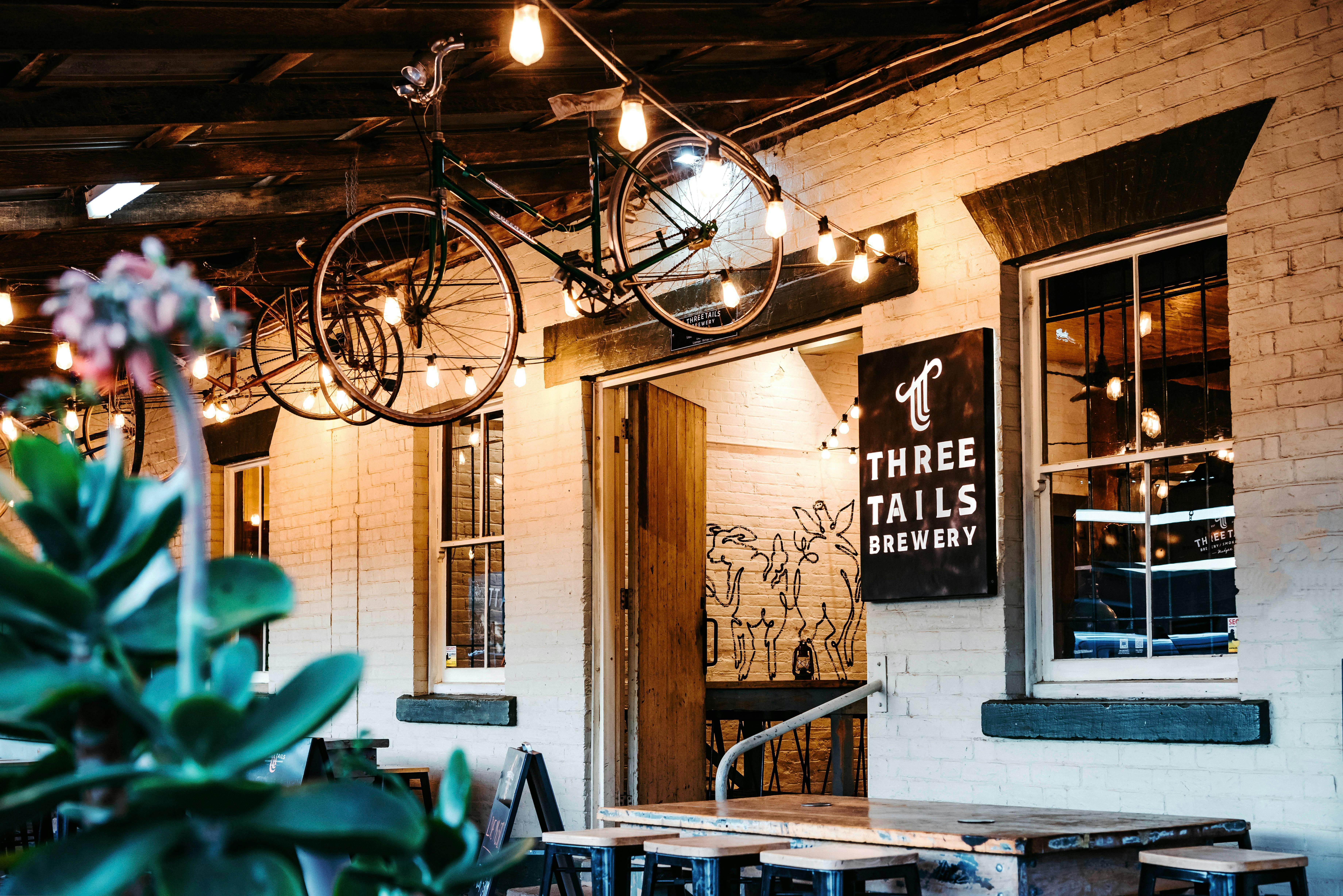 Photo of front door with bicycle hanging from roof