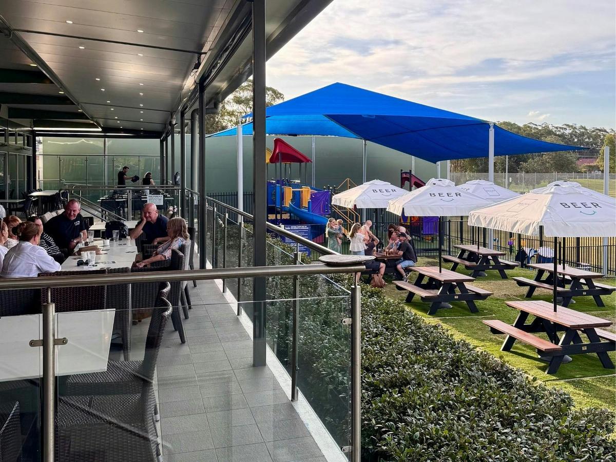 Covered Balcony area and beer garden next to the outdoor play equipment at Tradies Helensburgh
