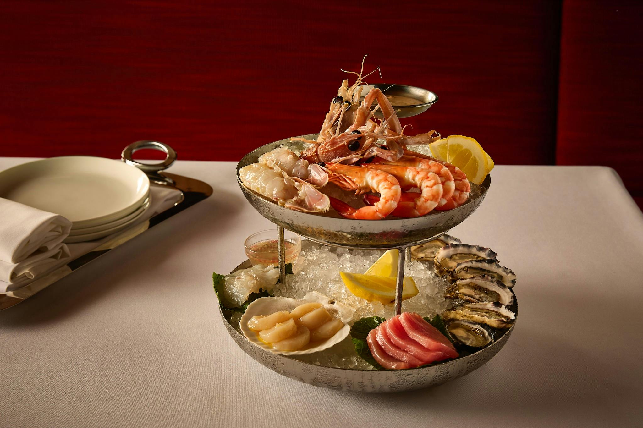 A seafood tower on a white tablecloth