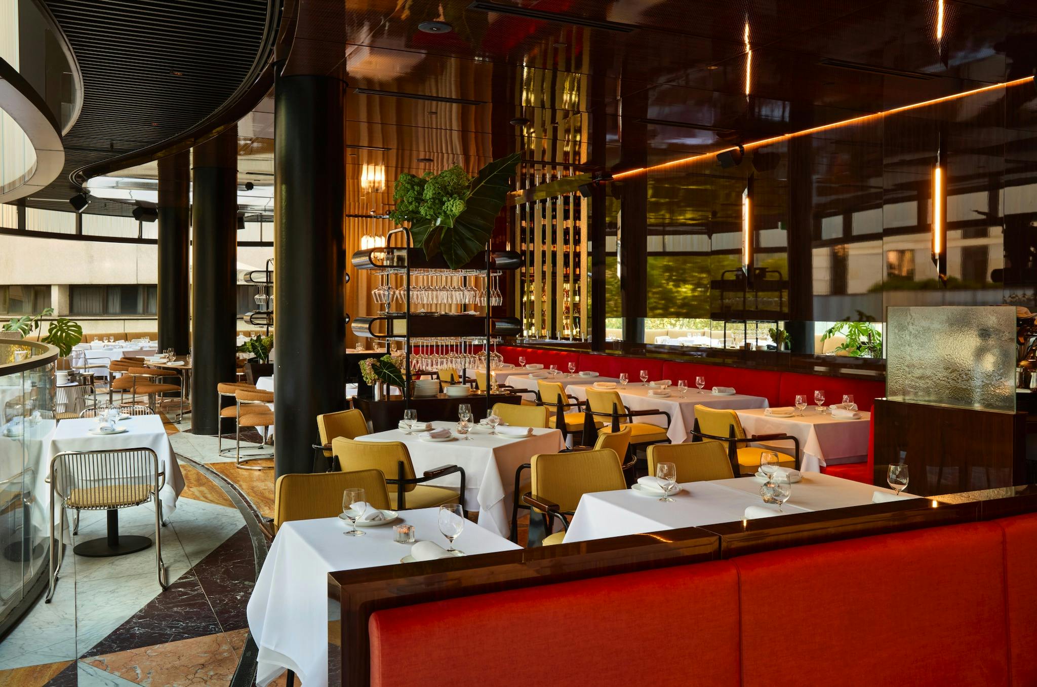 A luxurious indoor-outdoor dining room