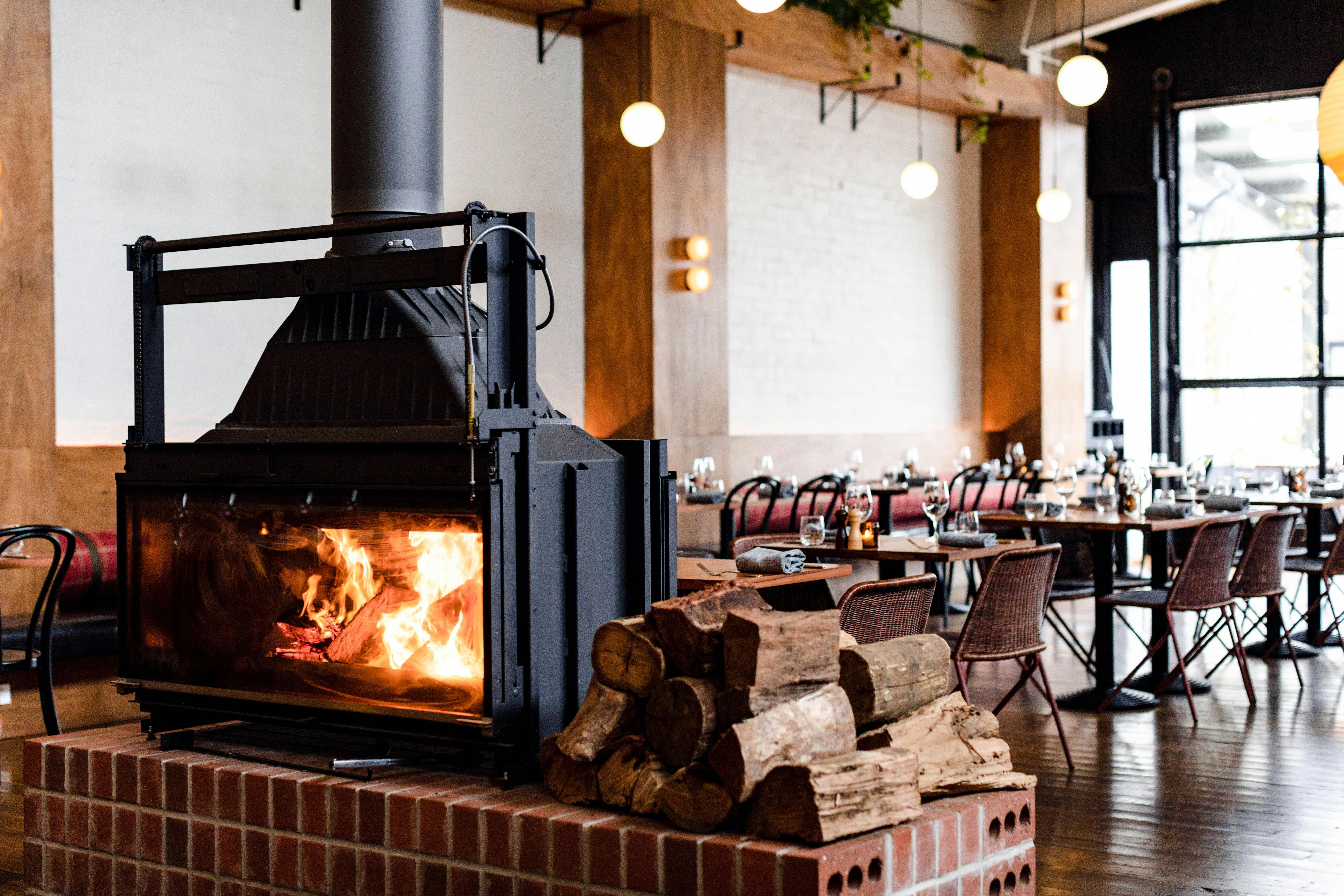 Warm up near the wood fireplace