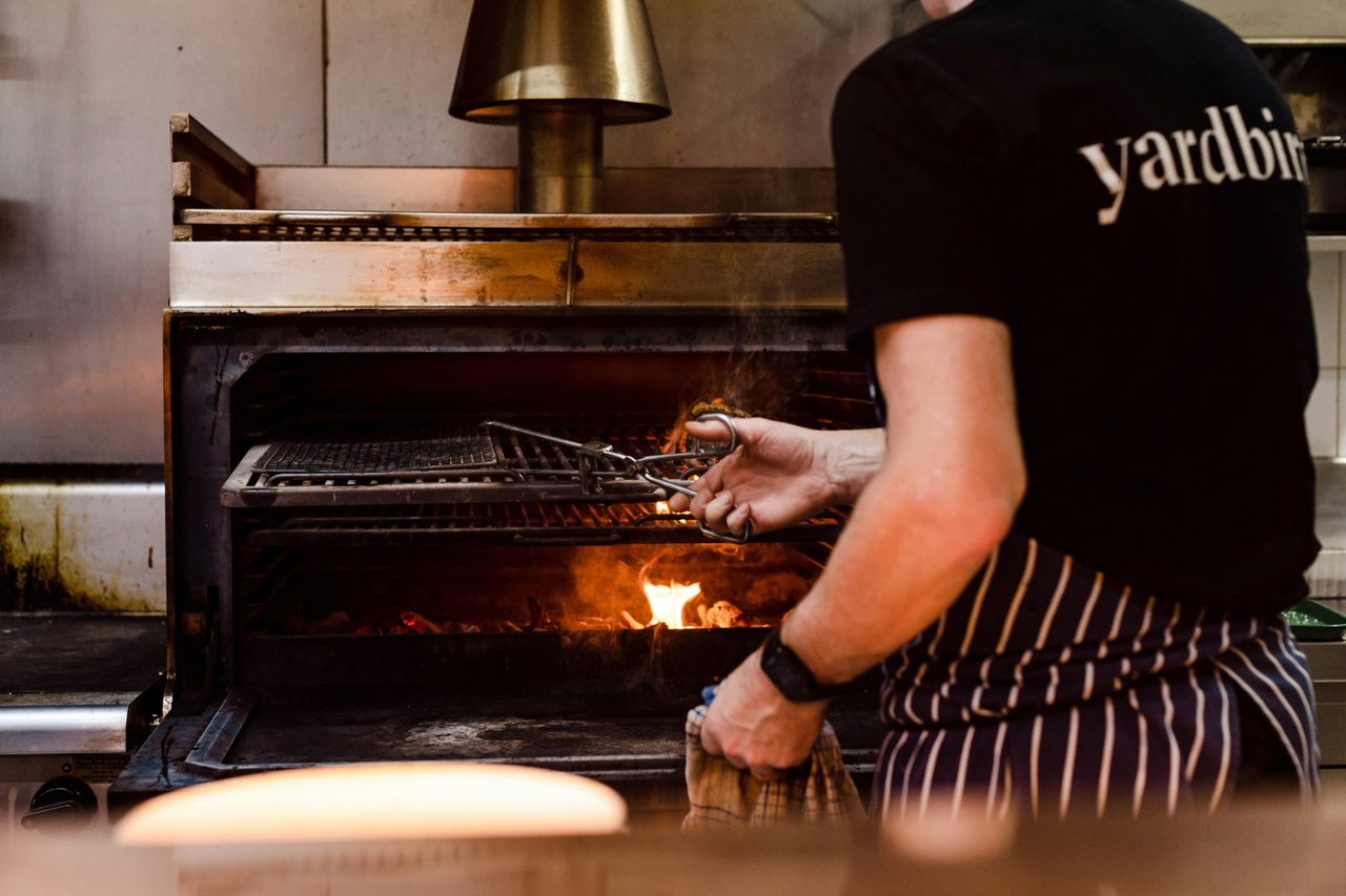 Cooking over open flames on the Mibrasa
