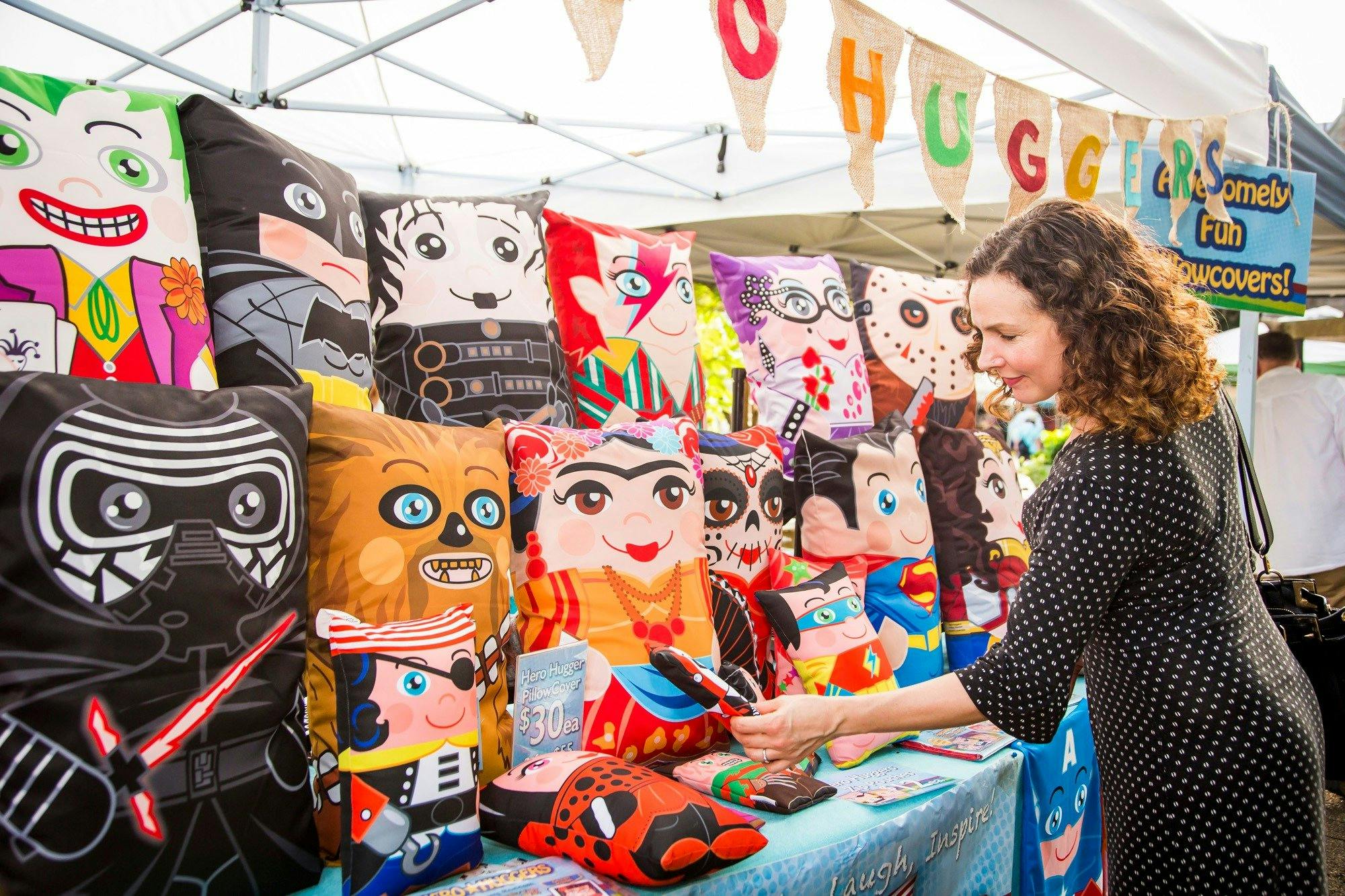 Woman browsing homewares at Balmain Markets