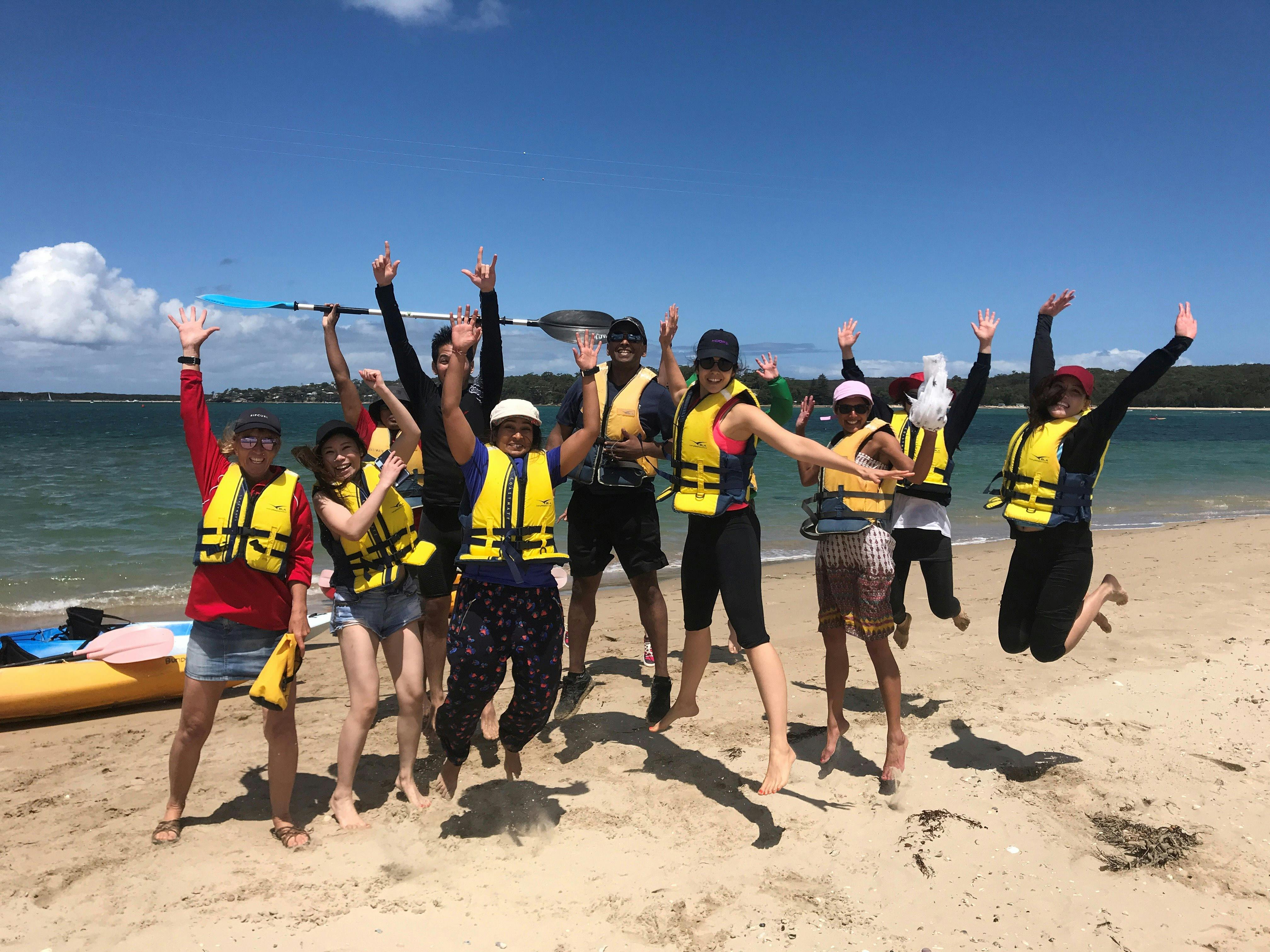 Kayak tour group on the sandspit