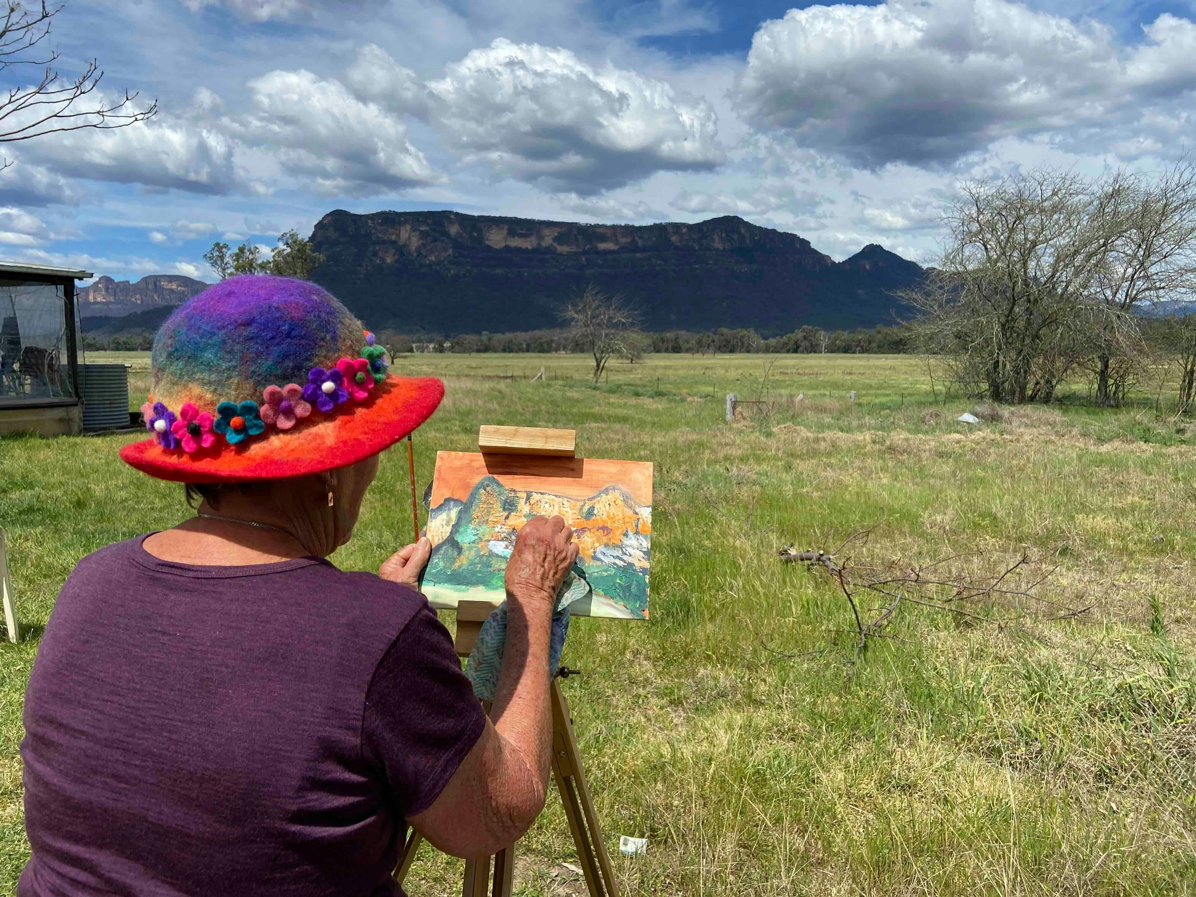 Painting workshop participant in the Capertee Valley