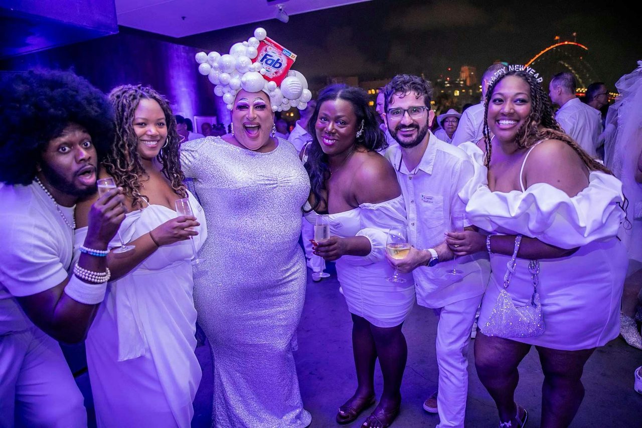 Frock Hudson and International Guests all in white.