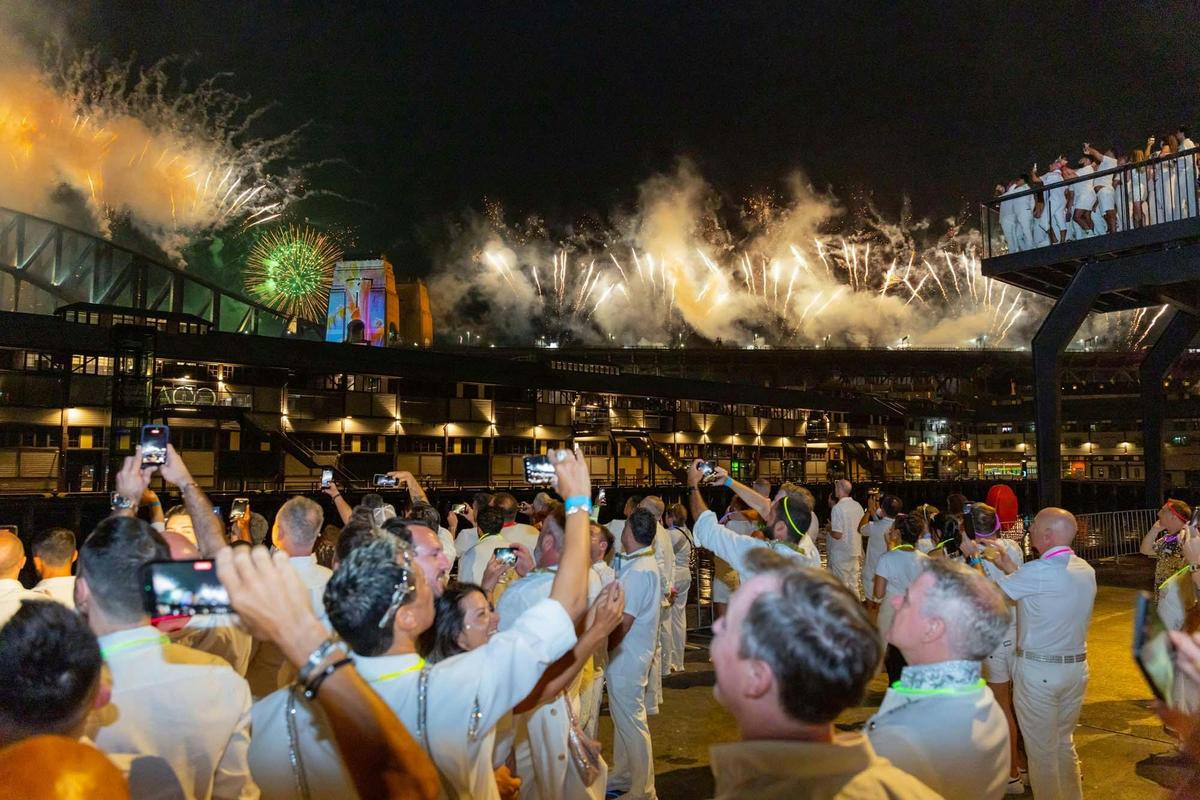 Guests watching Sydney New Year’s Eve fireworks from Walsh Bay.