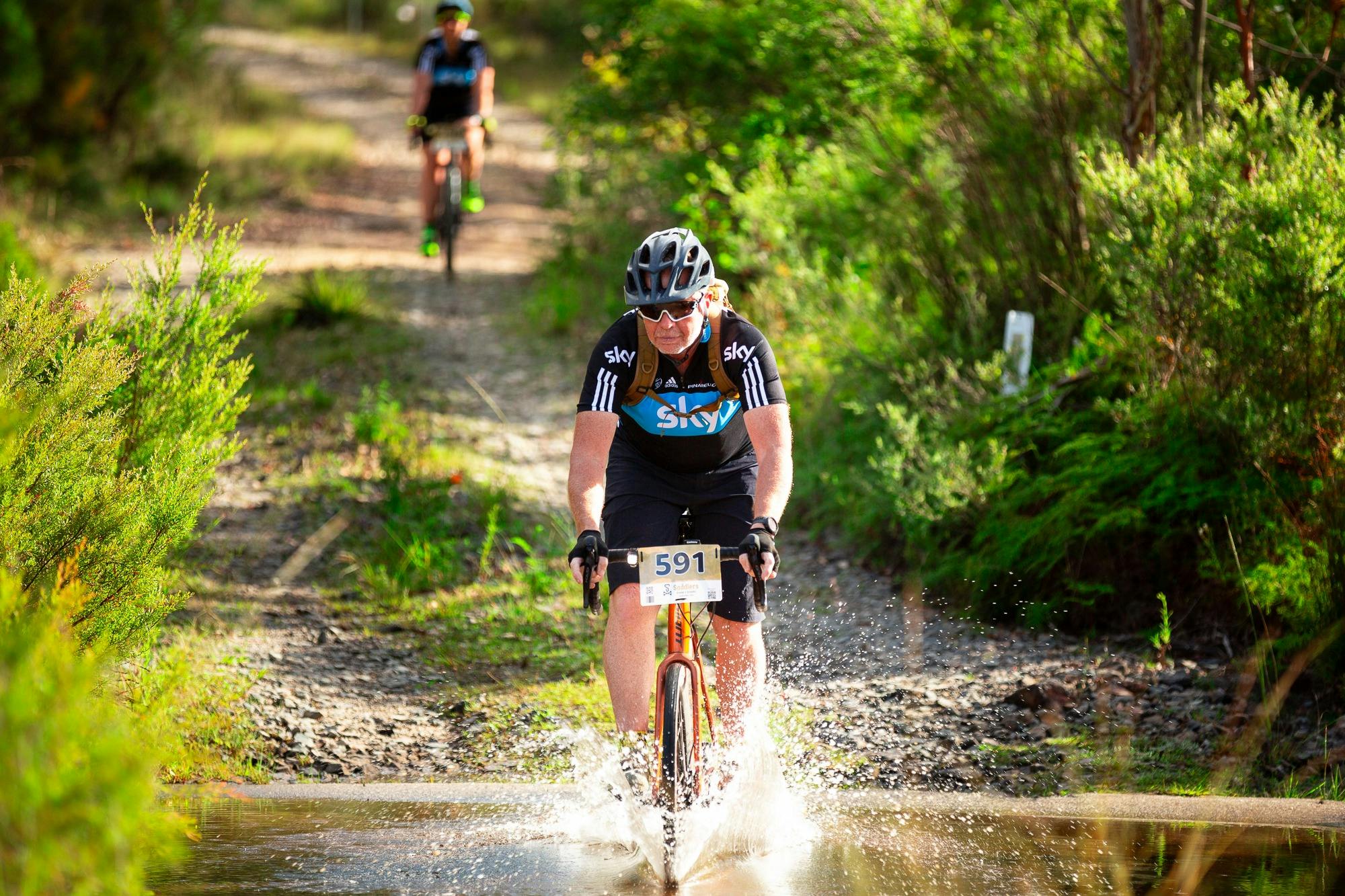 Riders cross water crossing - all courses