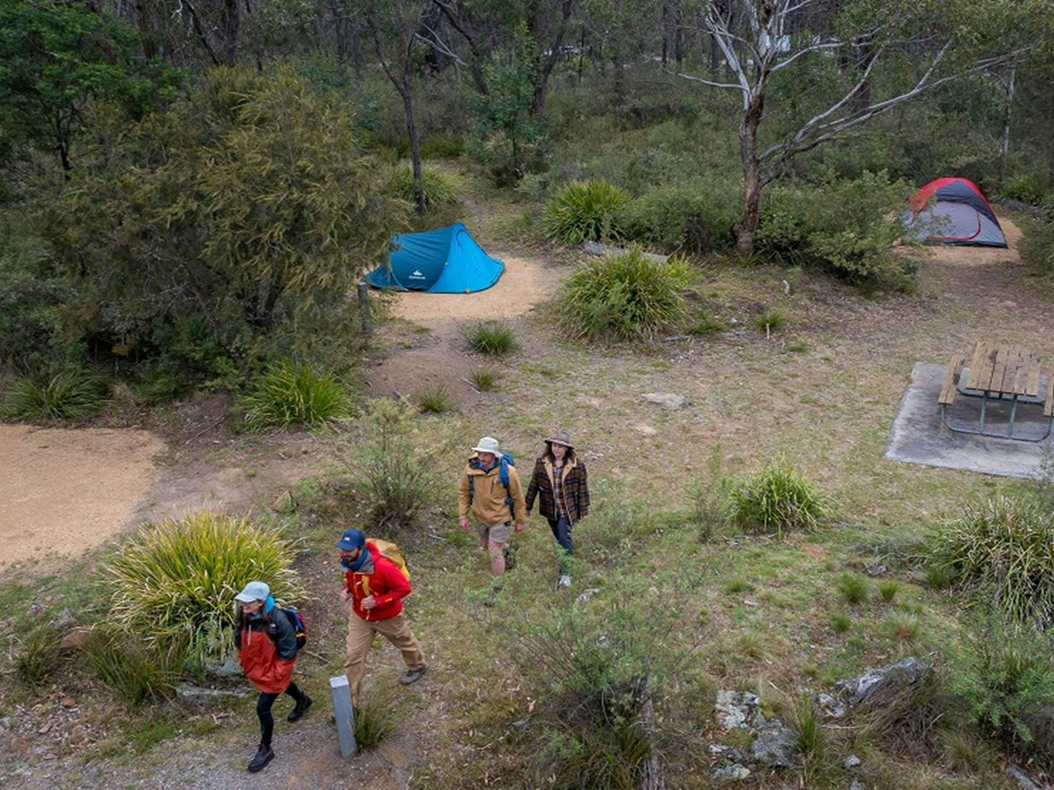 People set out for a walk from Bungonia campground, Bungonia National Park. Photo: John Spencer