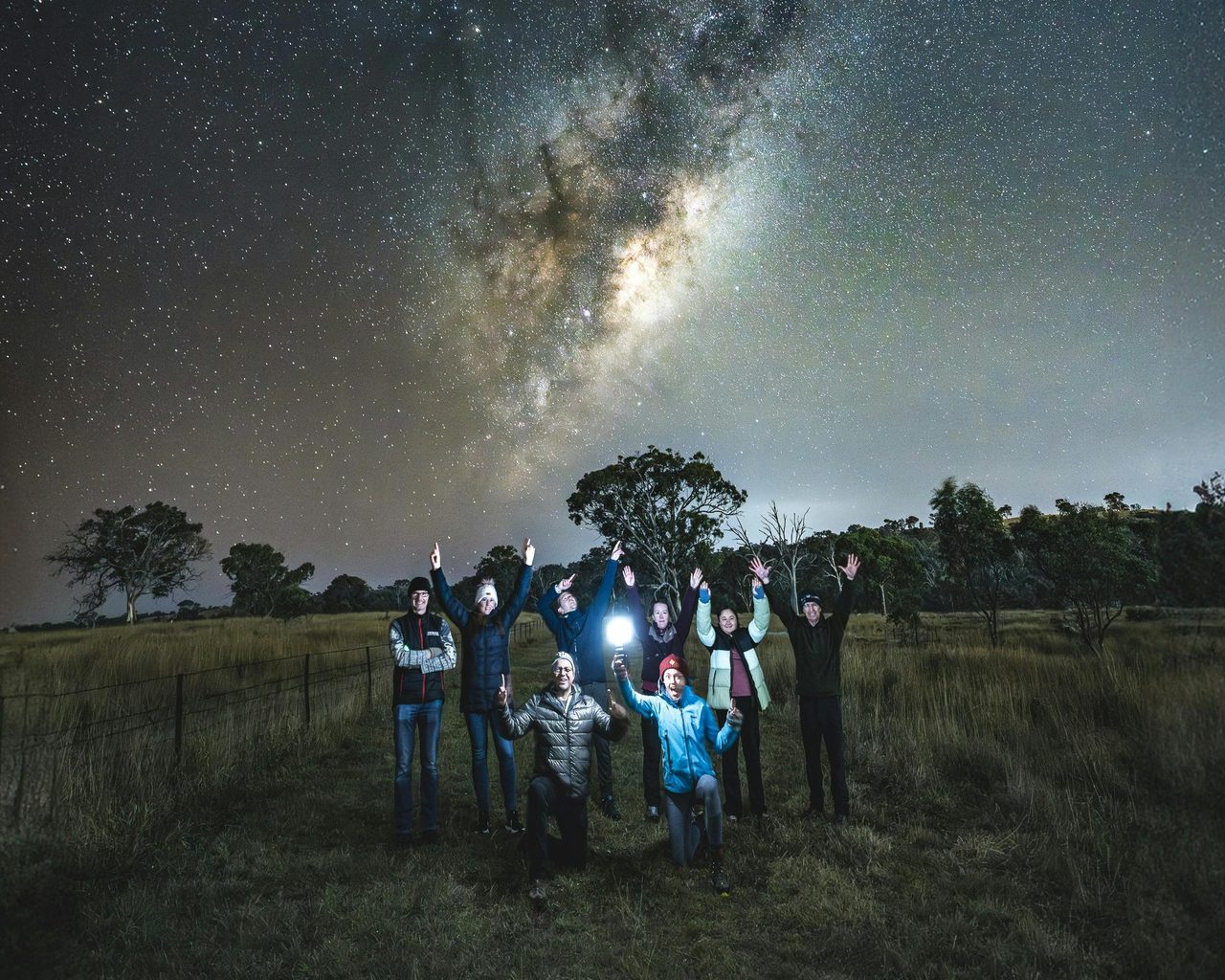 Group portrait under the Milky Way