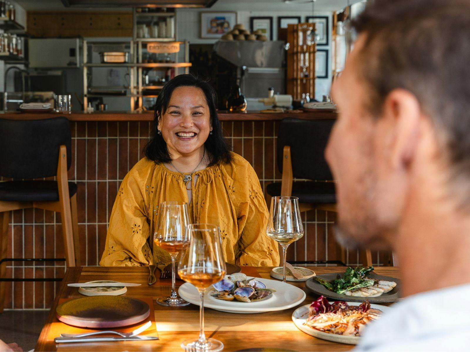 Women smiling at restaurant