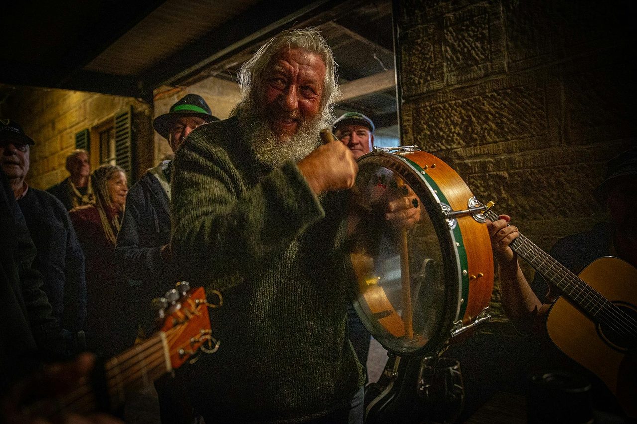 Attendees play music together in the Settlers Arms Inn at St Albans 2024