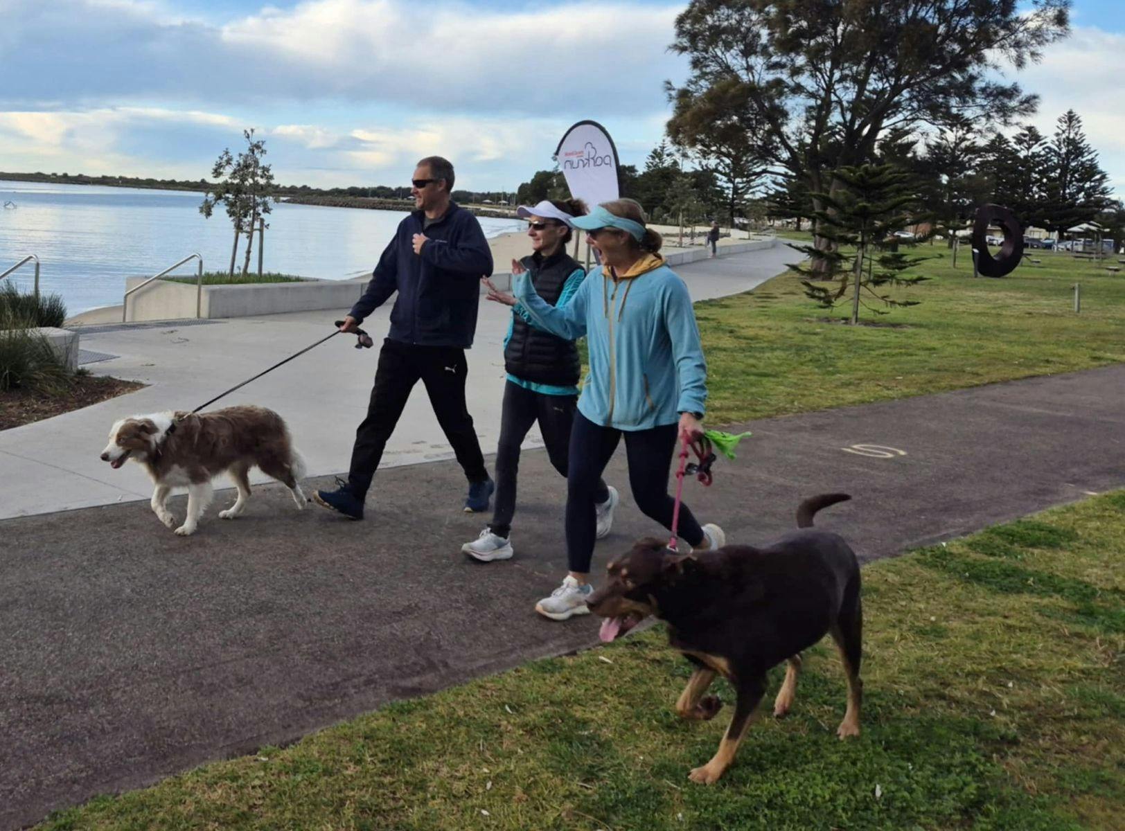 Park run at Reddall Reserve - three walkers with their two dogs