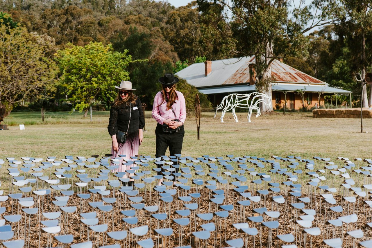 Visitors enjoying the Sculptures in the Garden