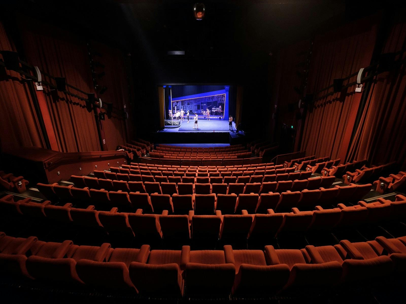 Photo of the stage and seating from the back row at Capitol Theatre