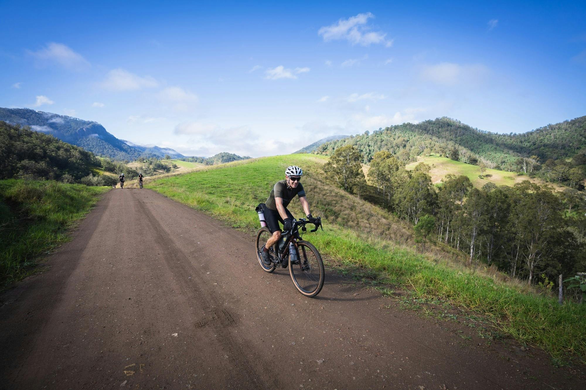 One of the riders enjoying the smooth gravel roads and big blue skies
