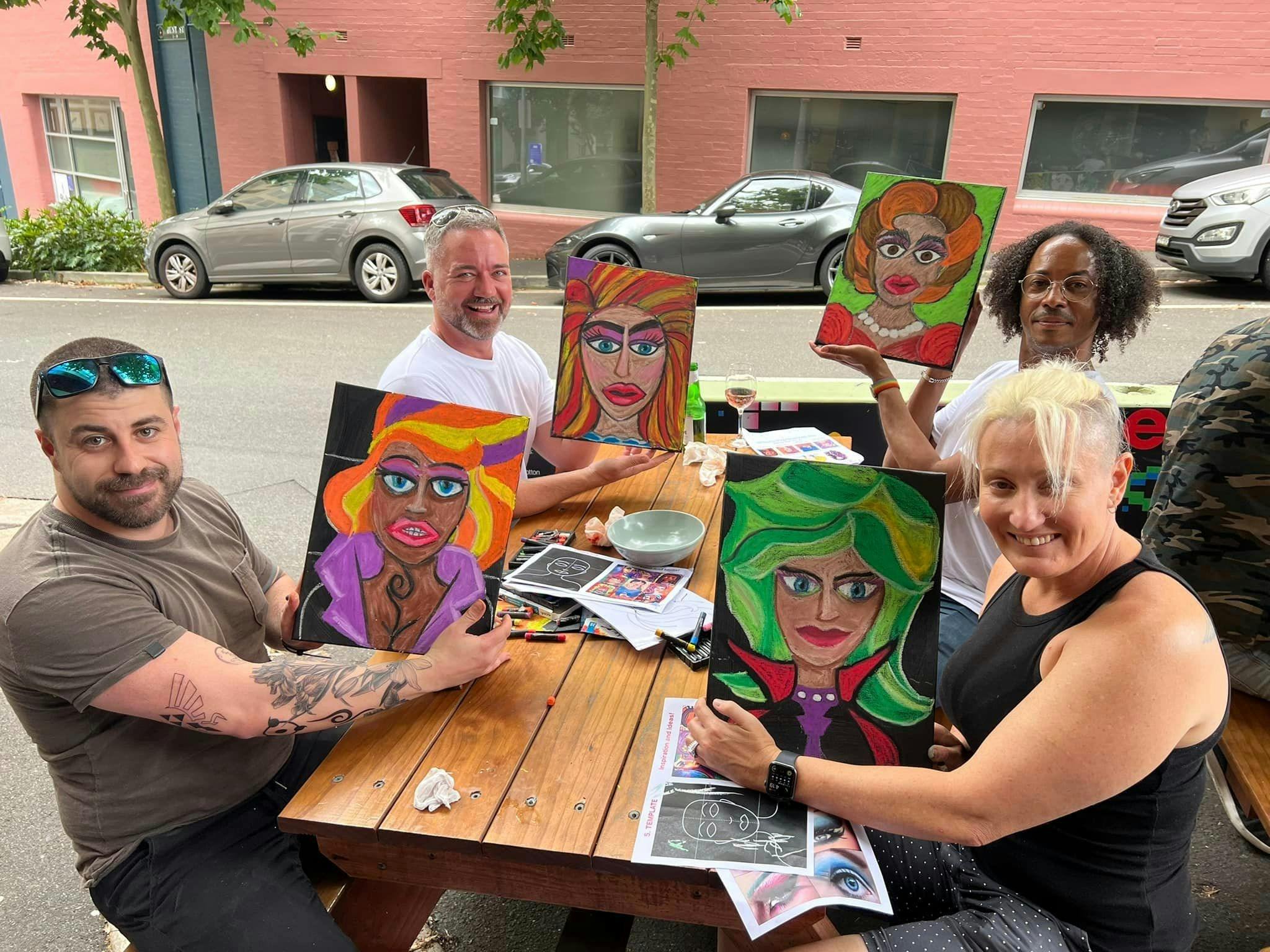 class students with their artworks