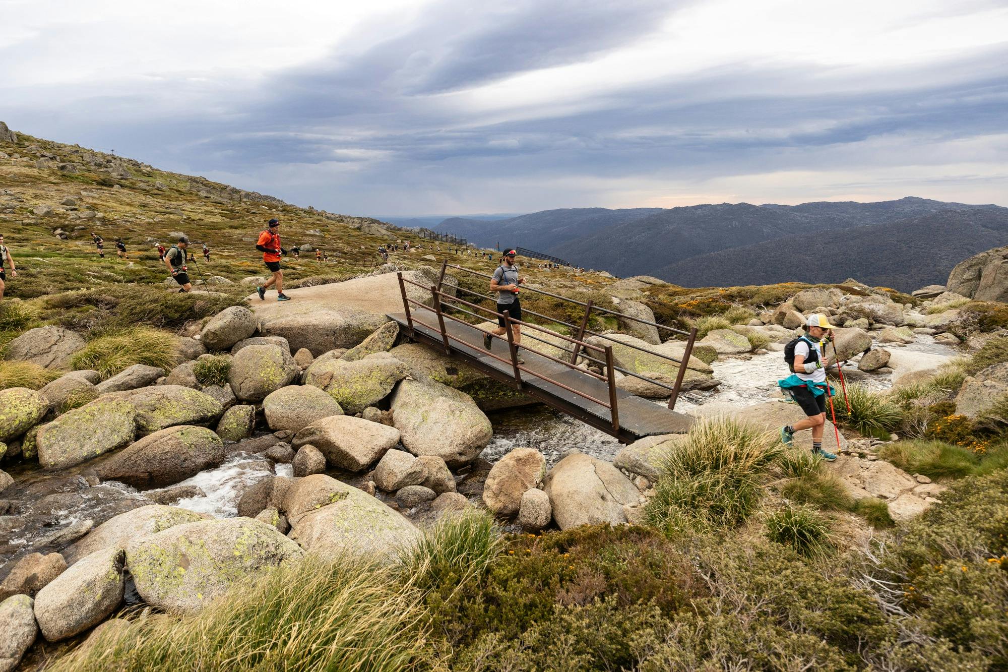 Runners on bridge