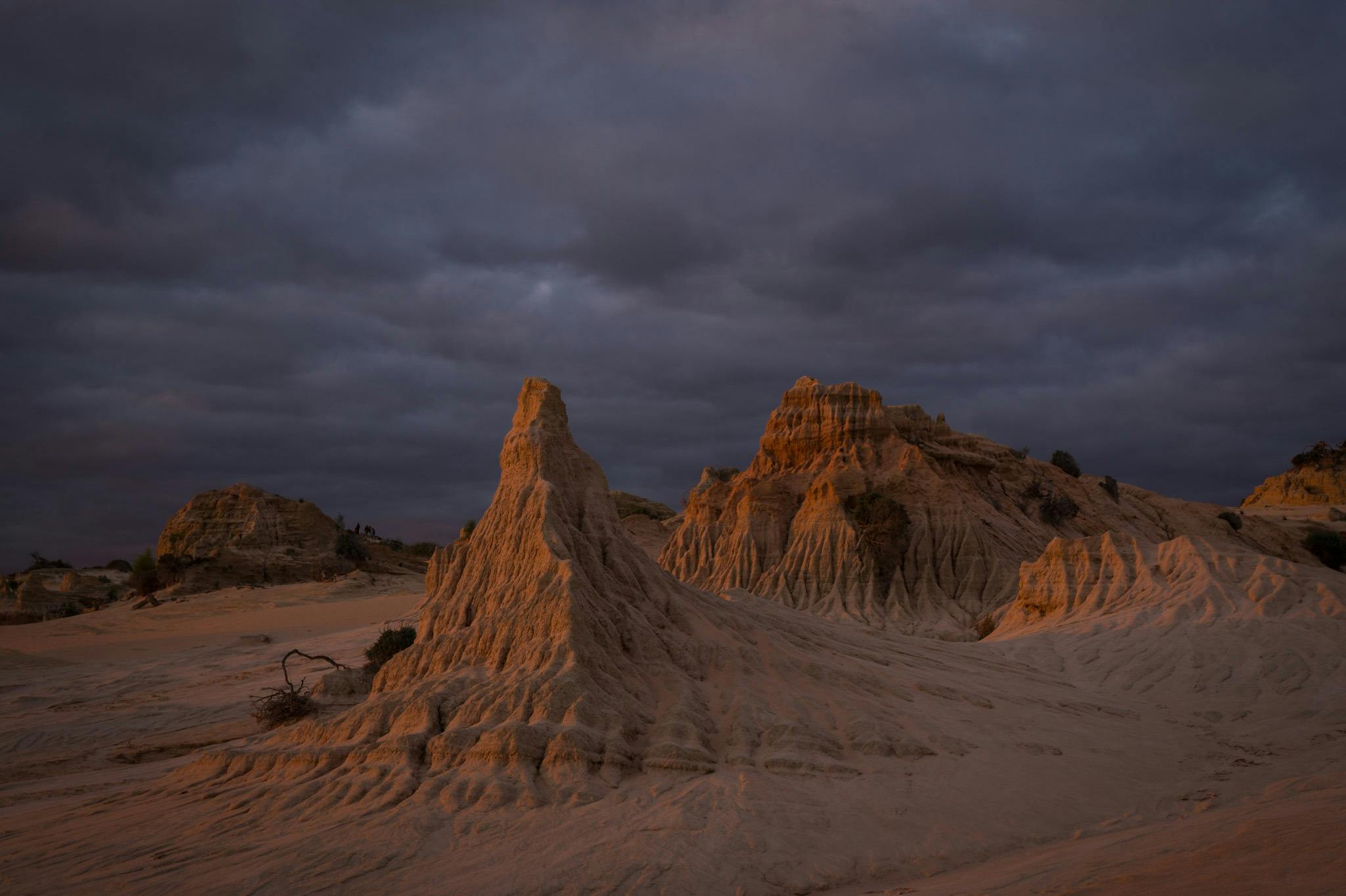 Photograph the Sun setting at the Walls of China in Mungo National Park