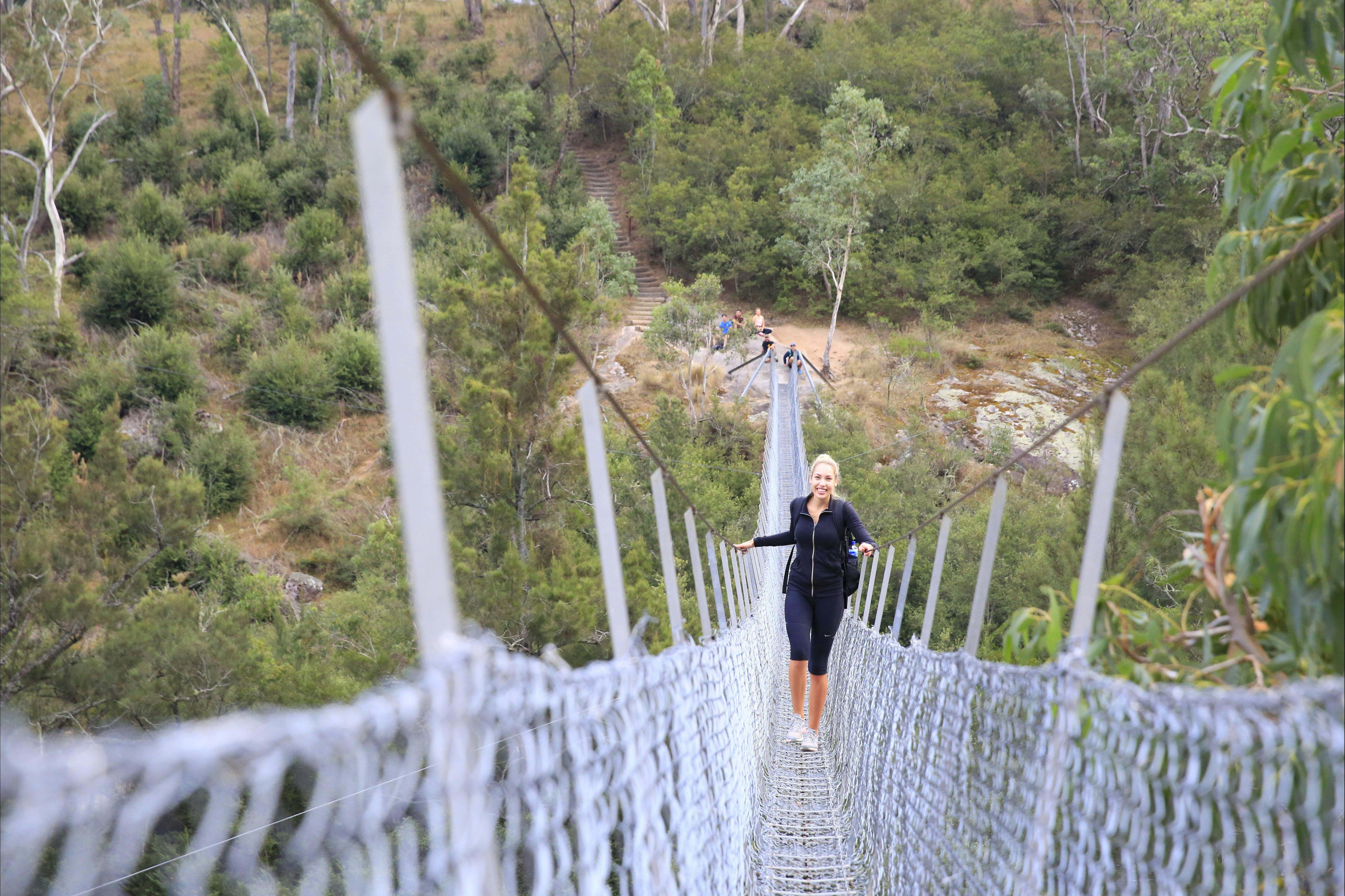 Crossing Bowtells Swing Bridge on our Six Foot Track trek