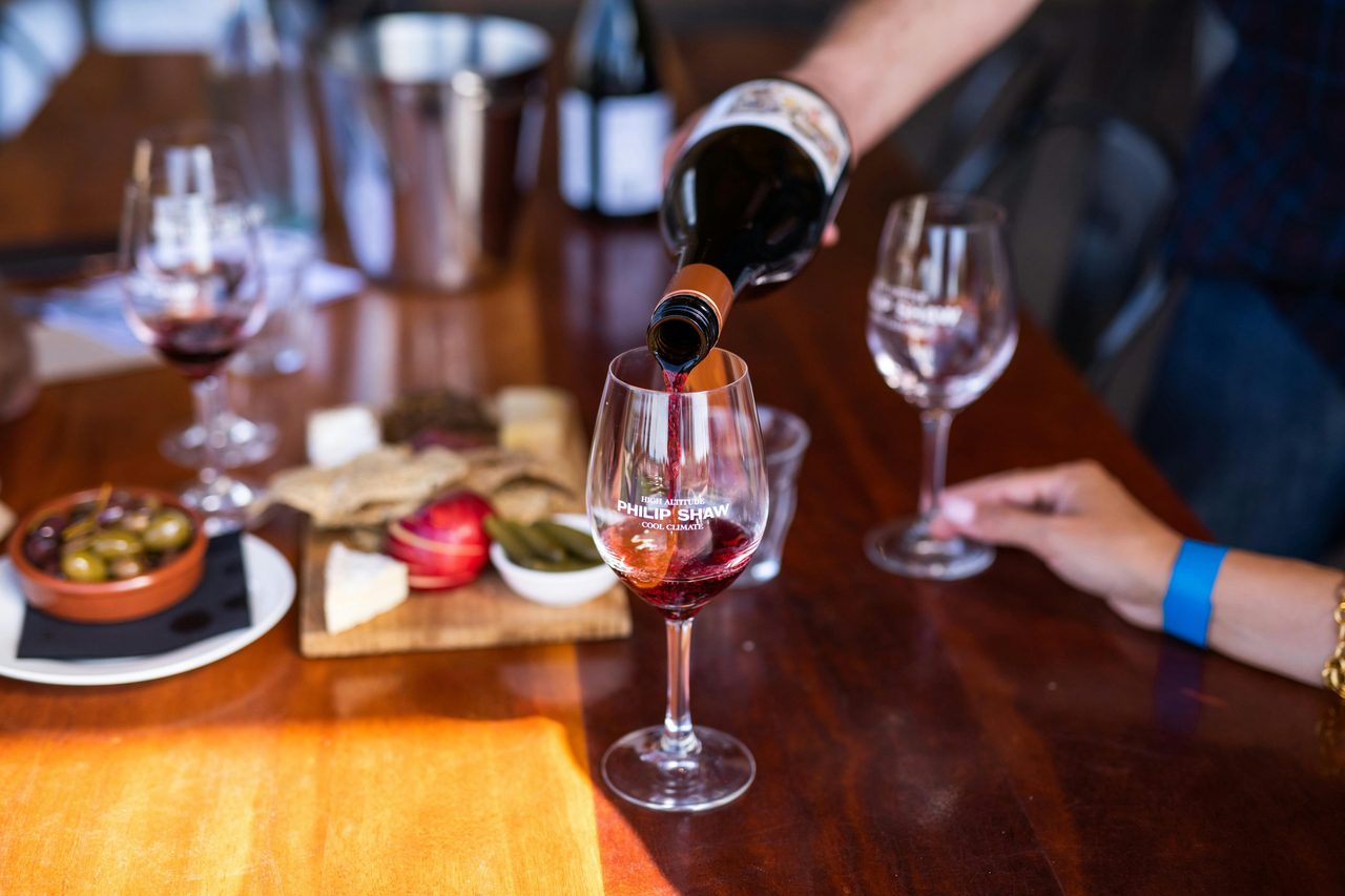 A wine being poured during a tasting