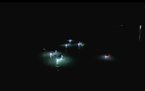 Aerial photo of night kayak tour