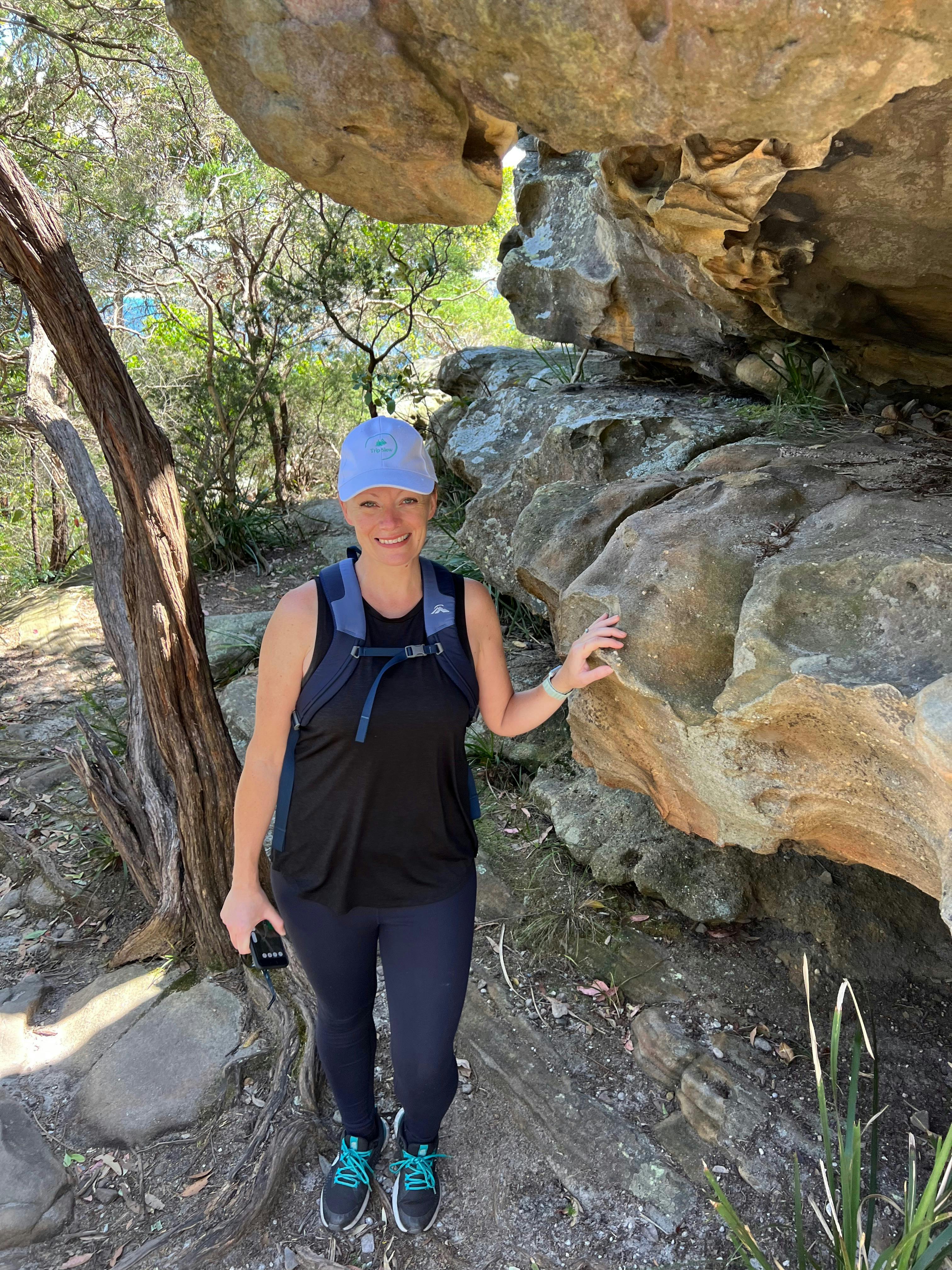 Guide next to a rock.