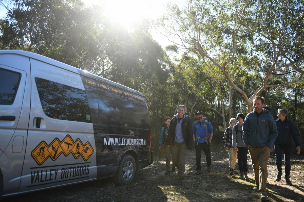 People leaving the bus for an adventure