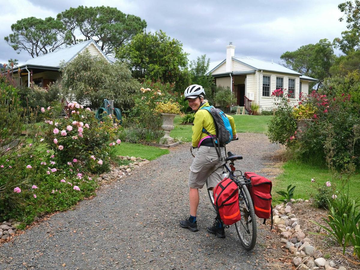 Cyclist arriving into the accommodation  in South Wolumla.