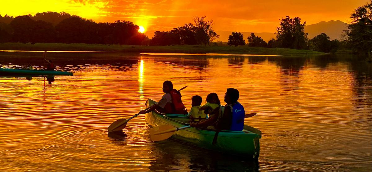 Family time at sunset - what a fiery golden evening with Bellingen Canoe Adventures