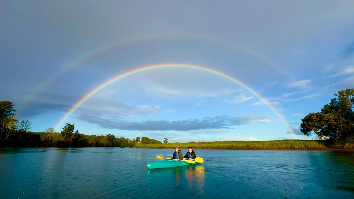 Magnificent double rainbow at sunset with Bellingen Canoe Adventures