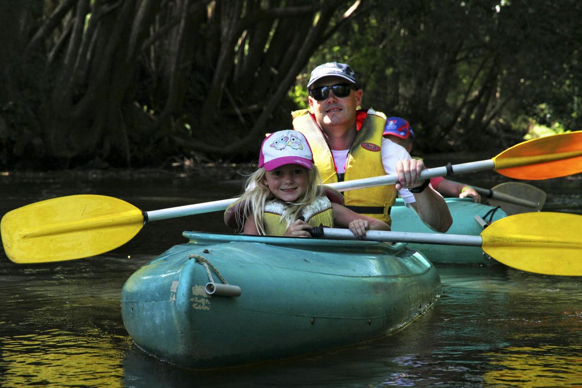 Paddling along the tranquil waters of the Bellinger River with Bellingen Canoe Adventures