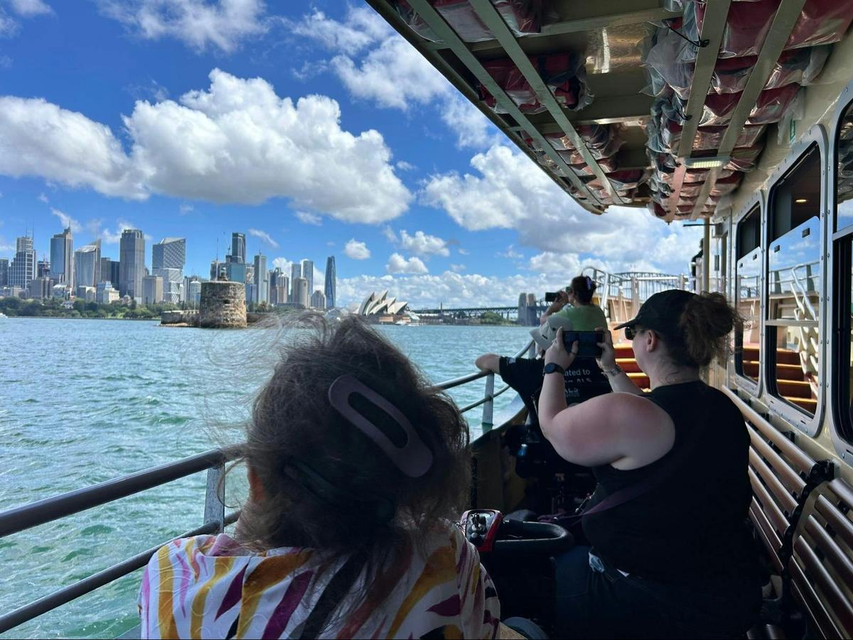 International clients aboard ferry across Sydney harbour