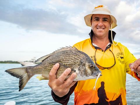 Luke with an awesome bream caught on lure