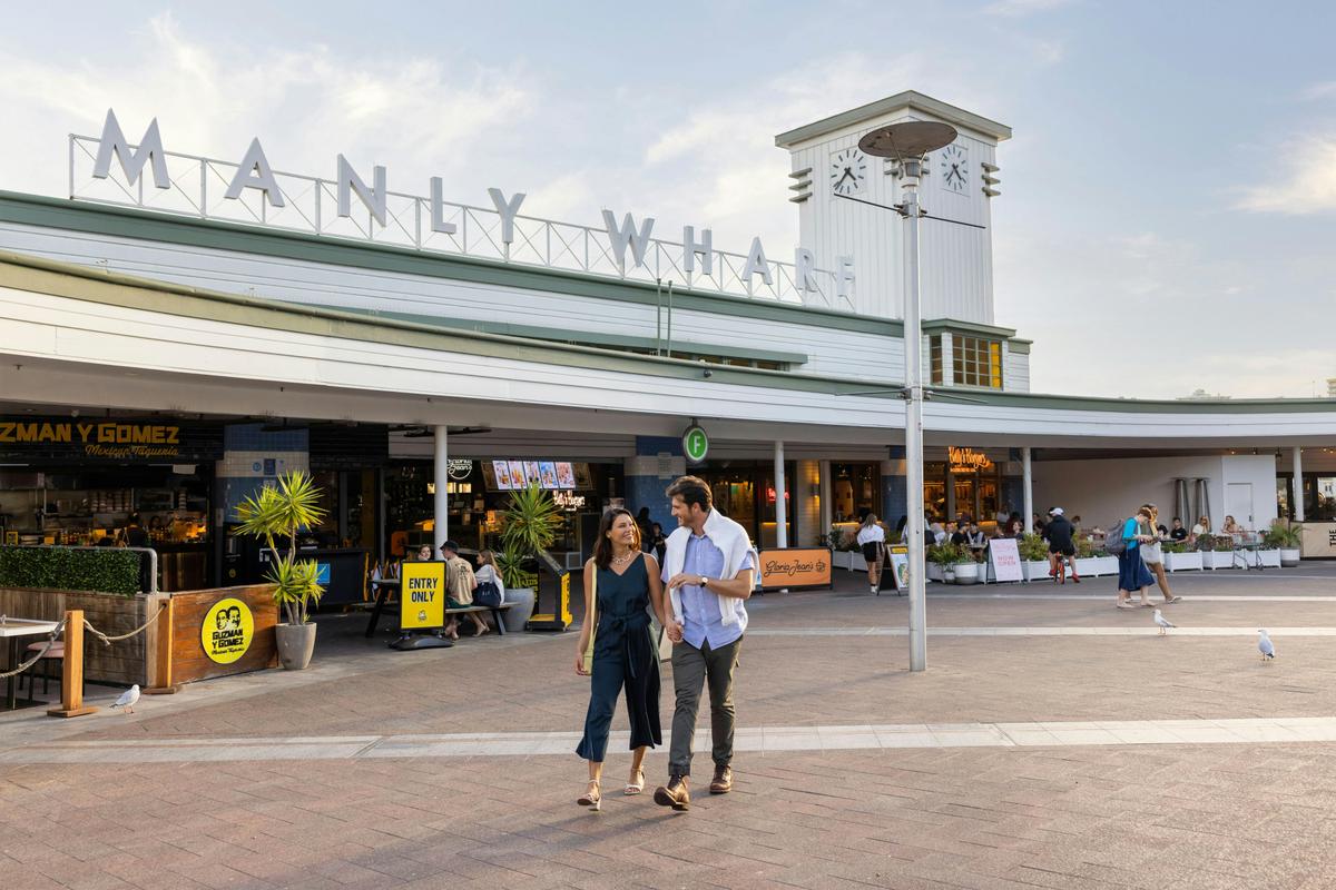 Couple walking near Manly Wharf