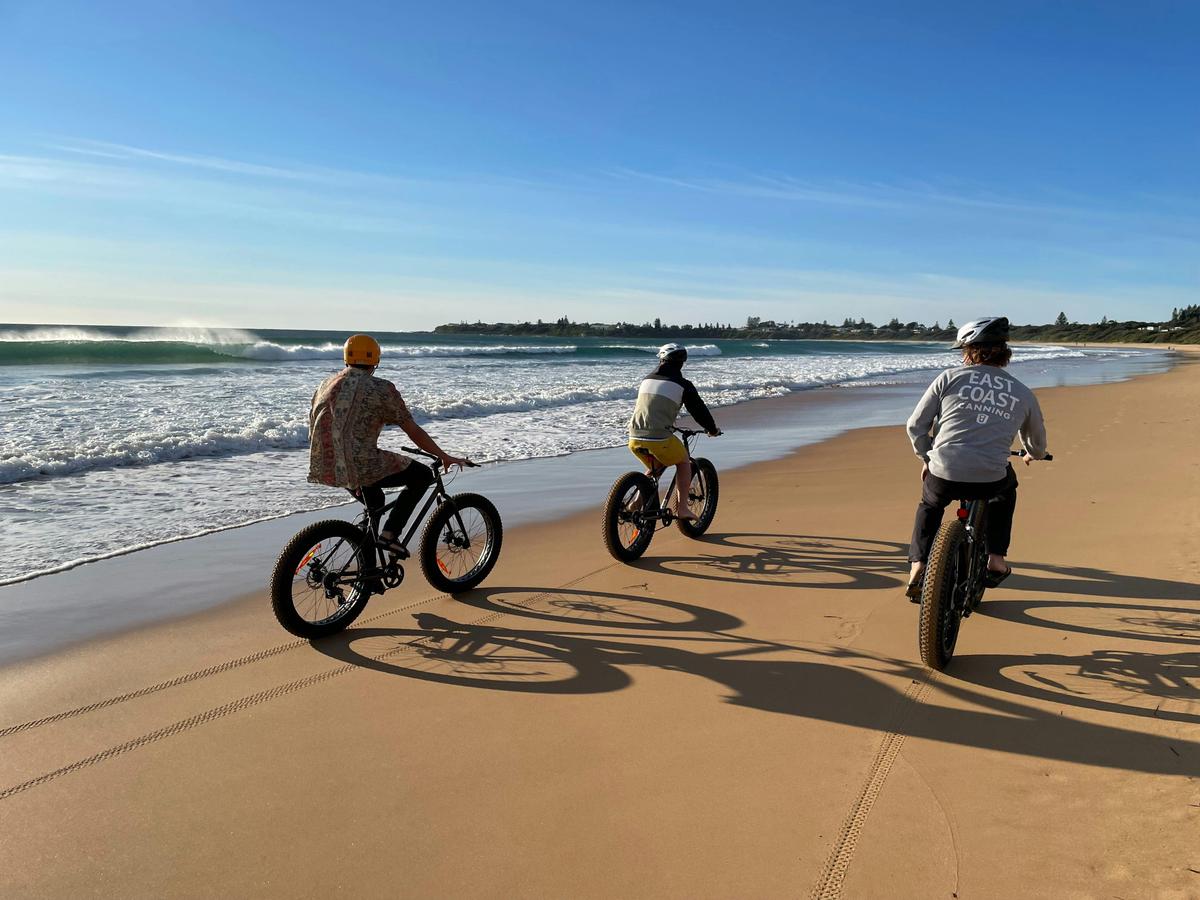 Fat bike beach tour group riders.