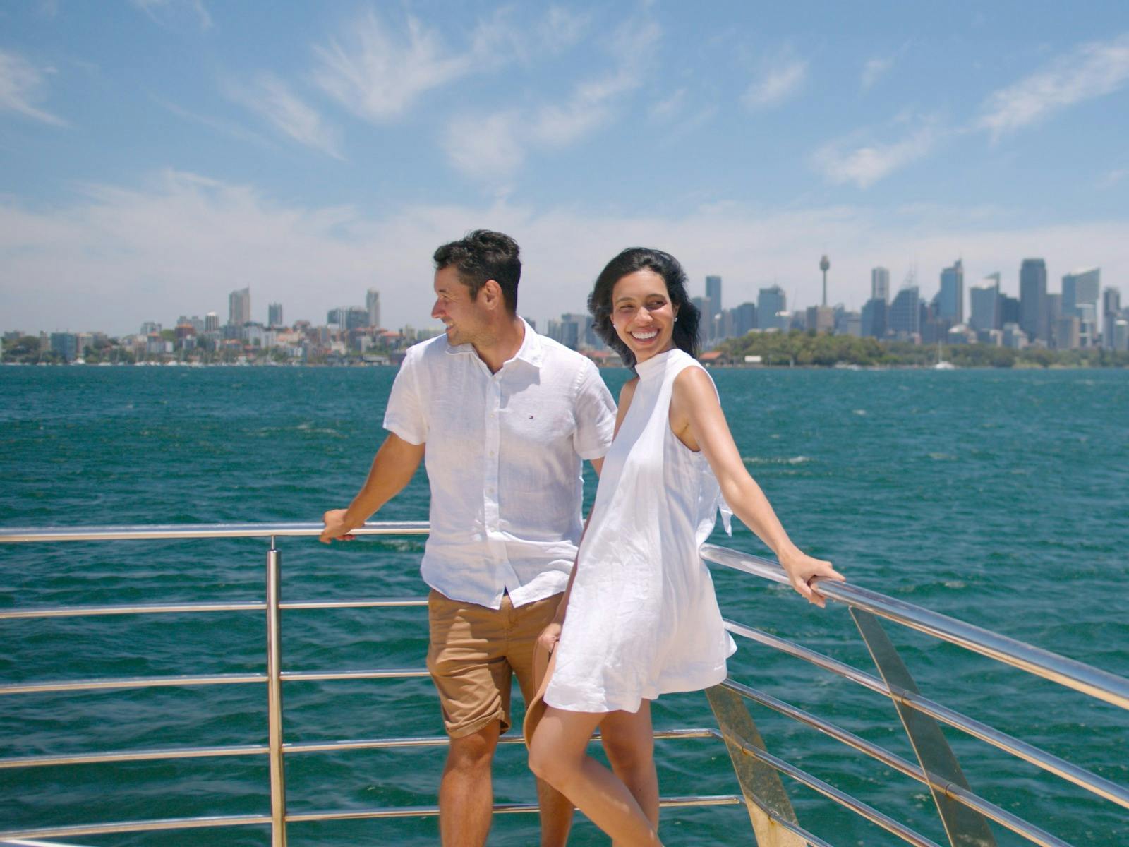 couple enjoying sightseeing cruise on Sydney Harbour
