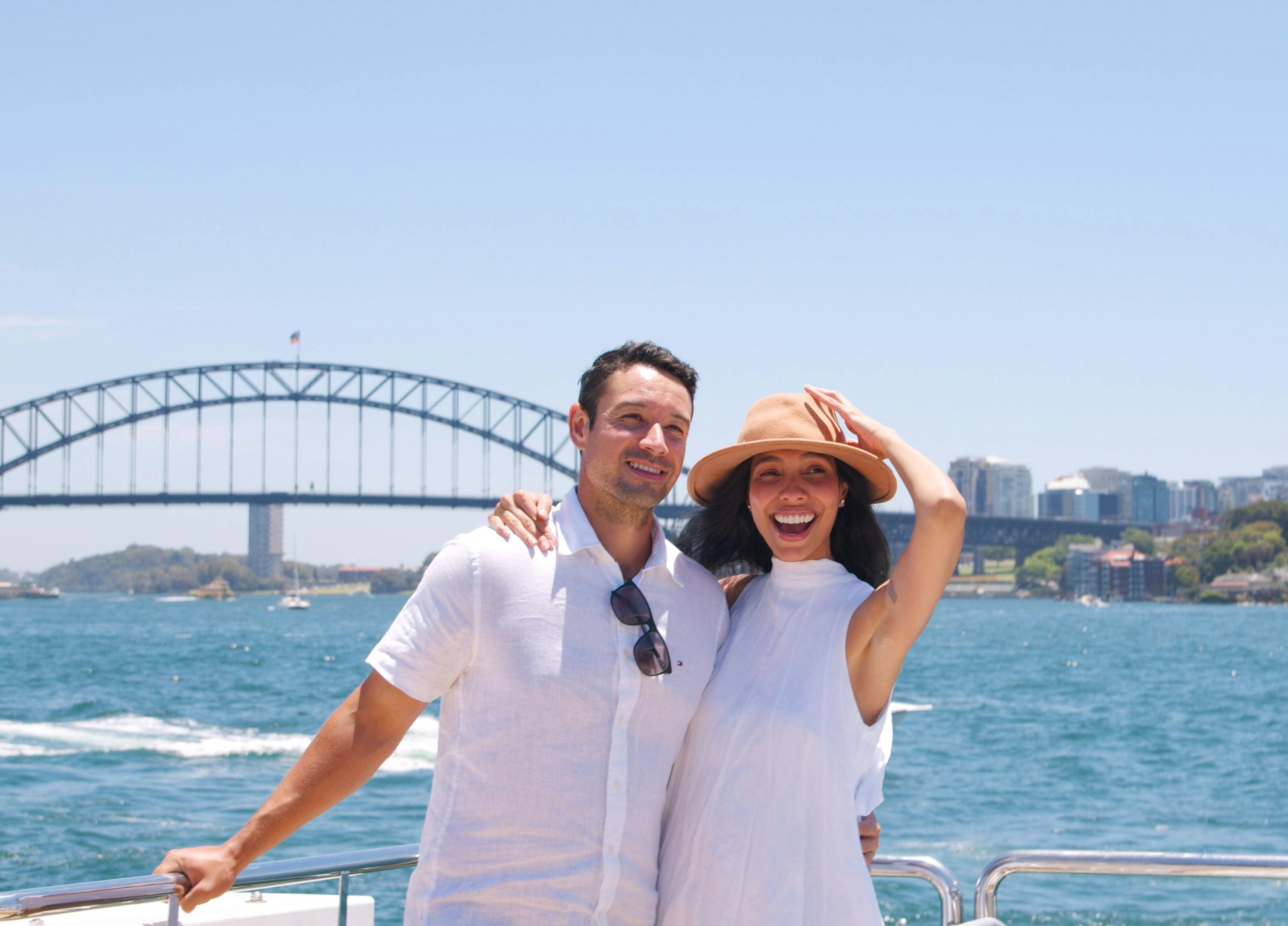 couple enjoying sightseeing cruise on Sydney Harbour